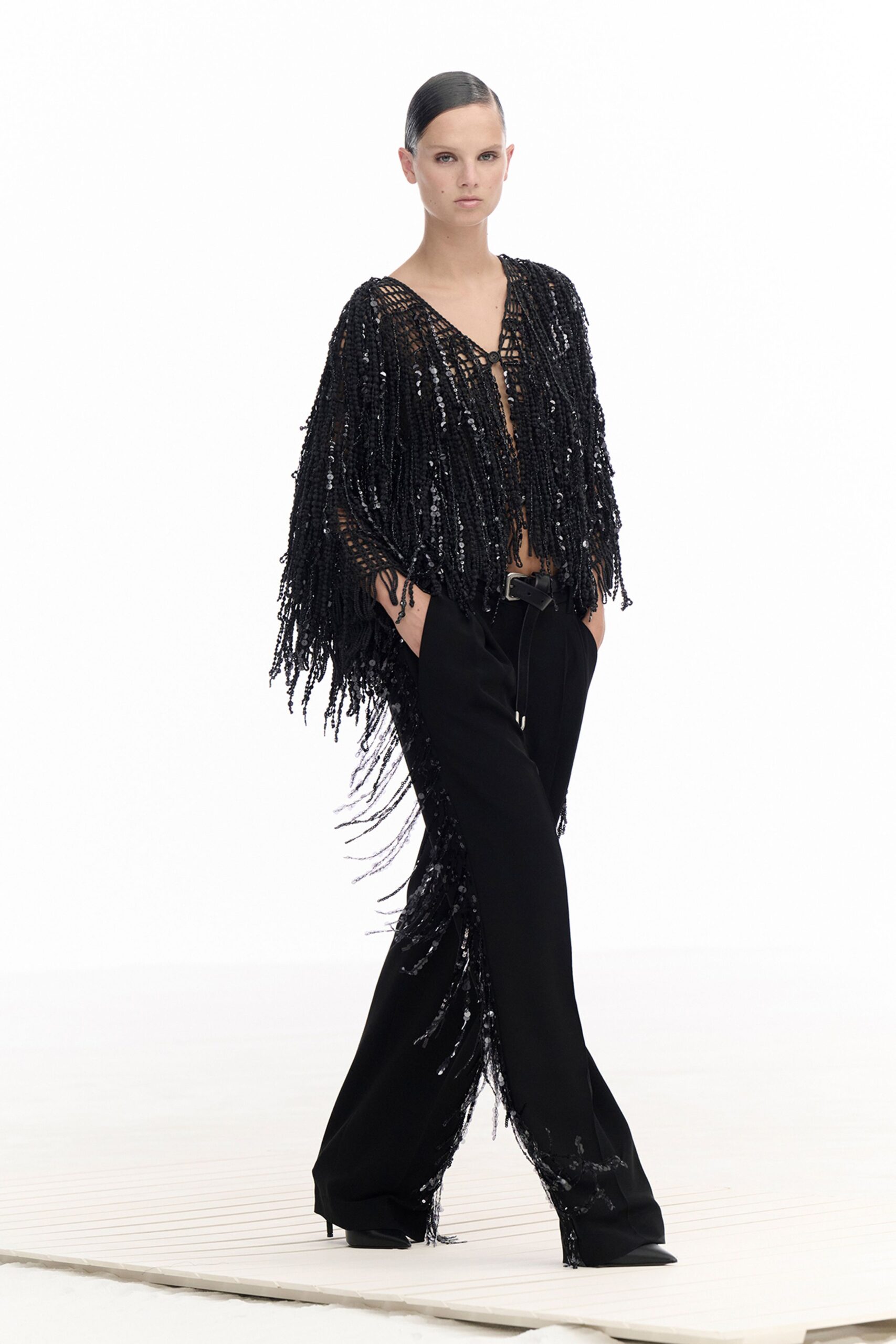 black sequined top and pants