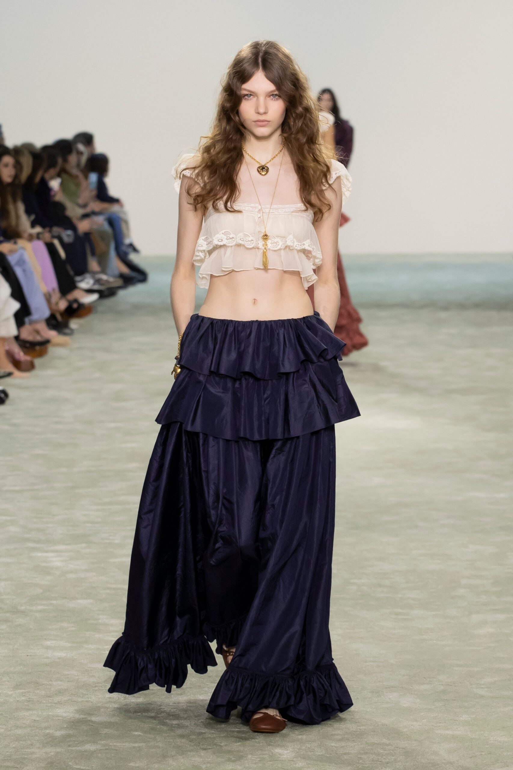 white cotton sleeveless high-neck fitted ruffled cropped top