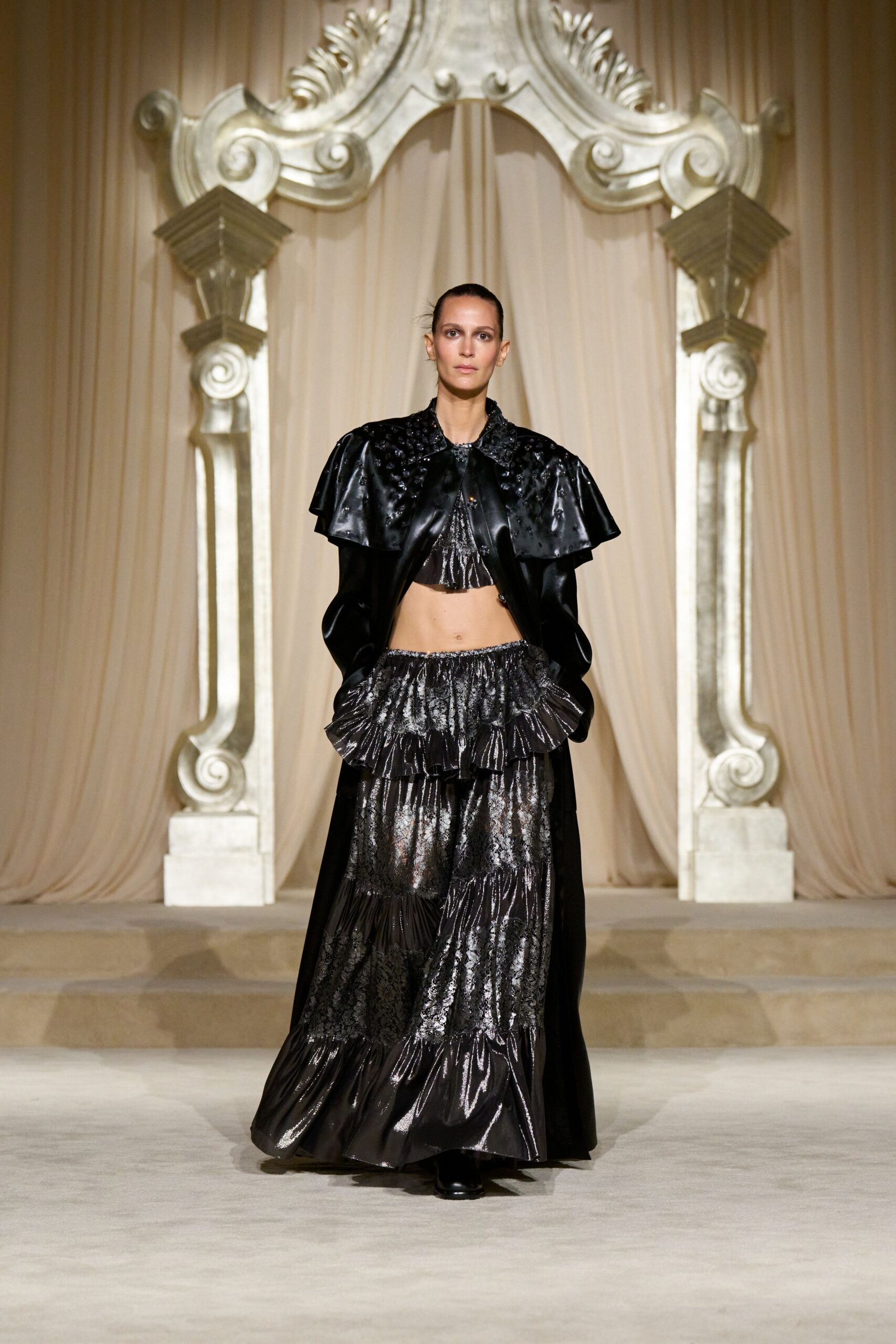 black leather short-sleeve structured cape