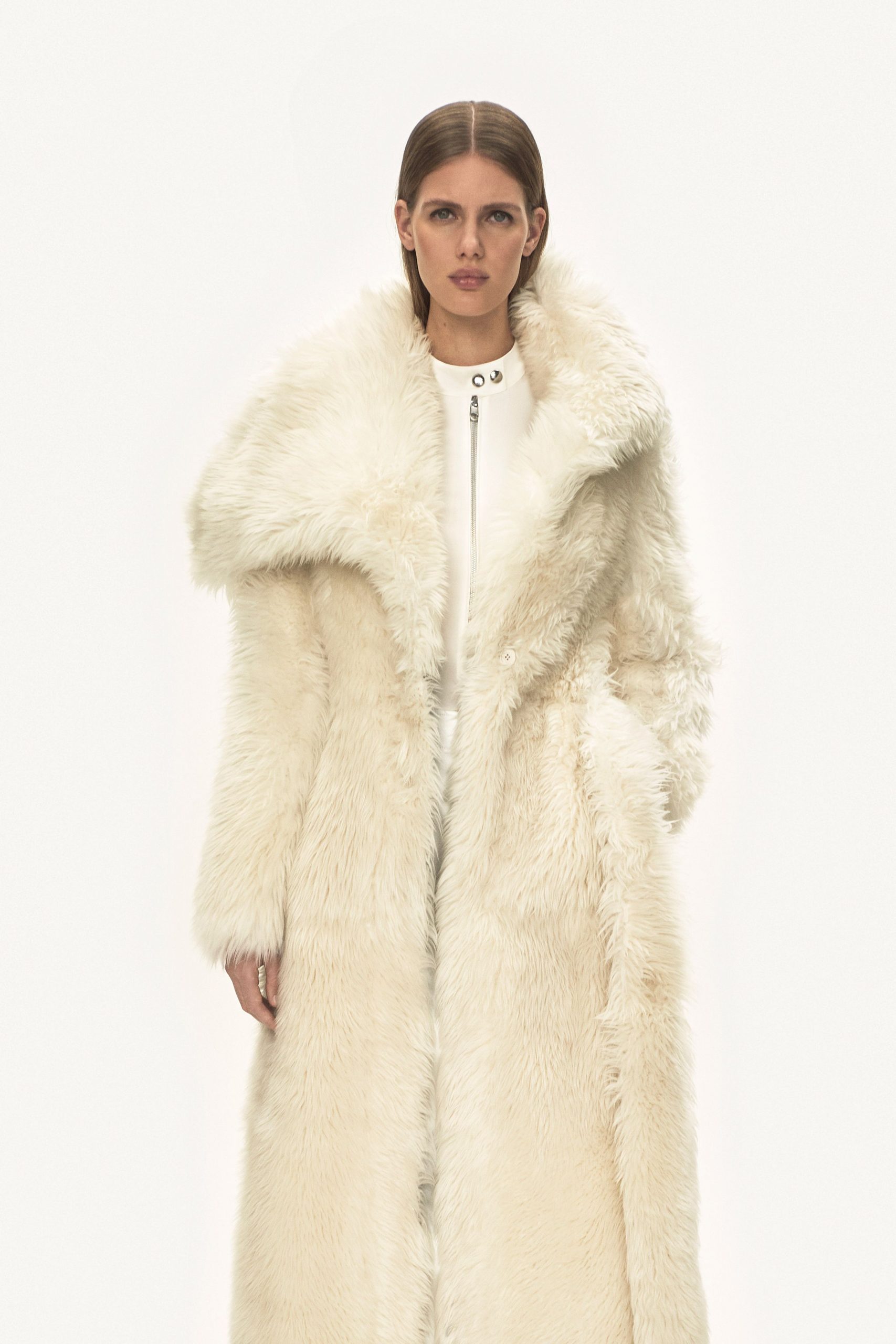 white faux-fur coat and dress