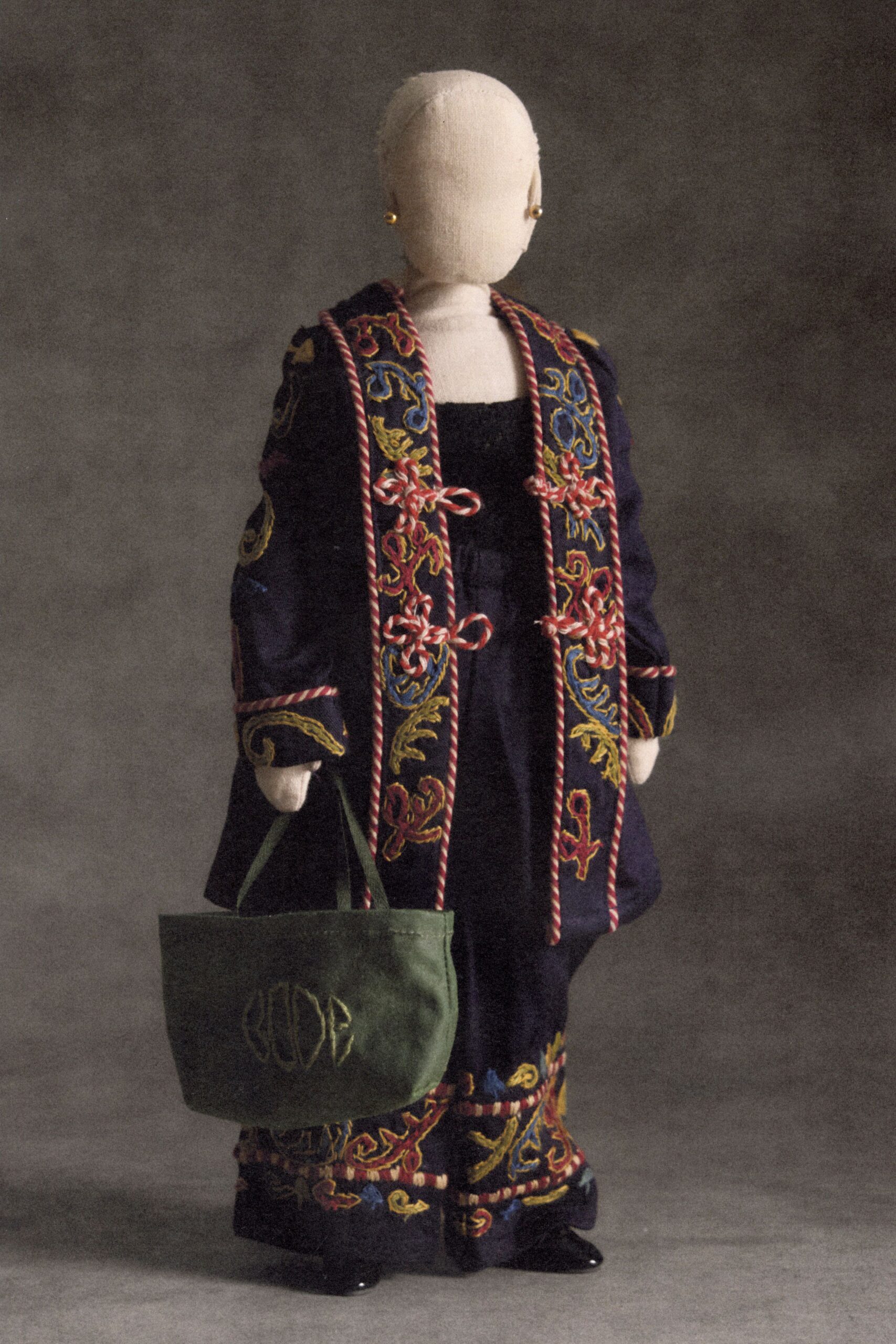 black wool long-sleeve collared oversized embroidered buttoned coat