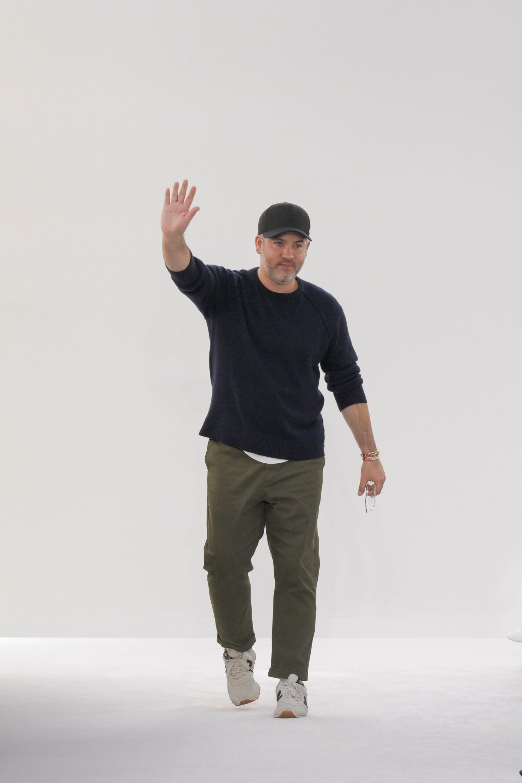 navy sweater olive pants white shoes