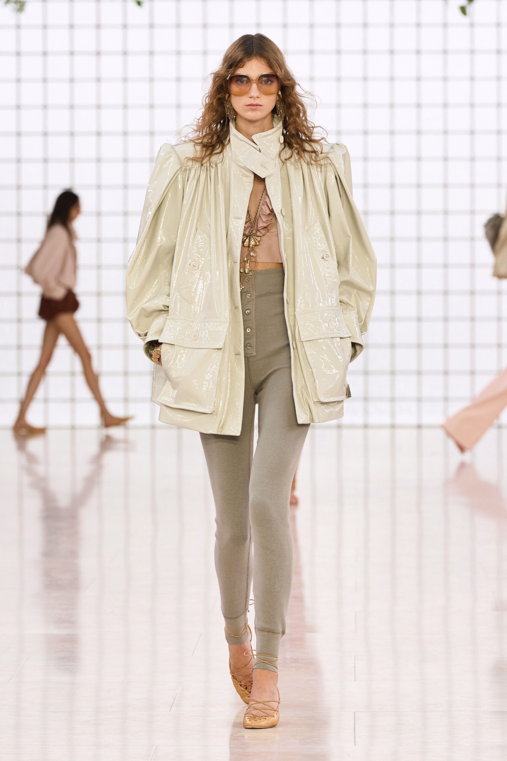 beige vinyl long-sleeve collared oversized padded shiny jacket