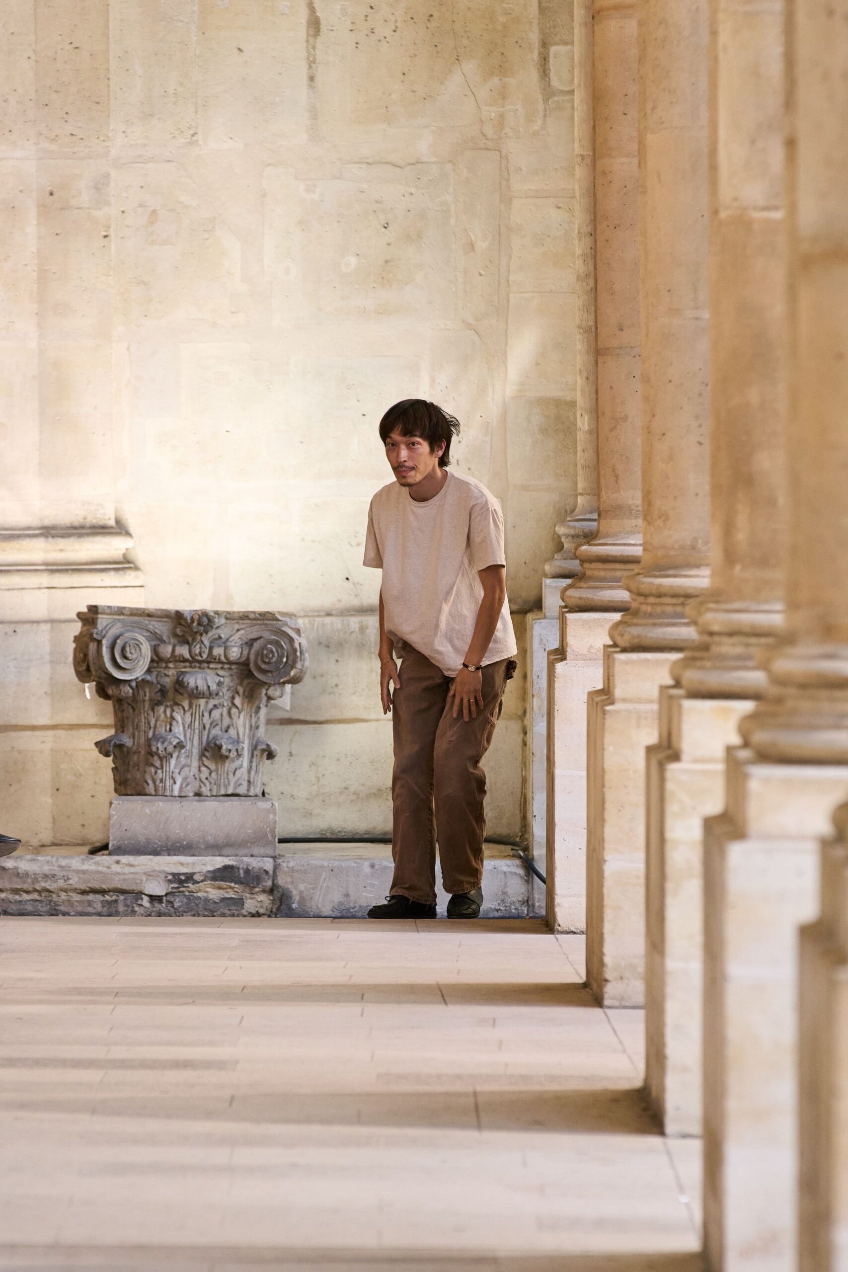 beige t-shirt brown pants
