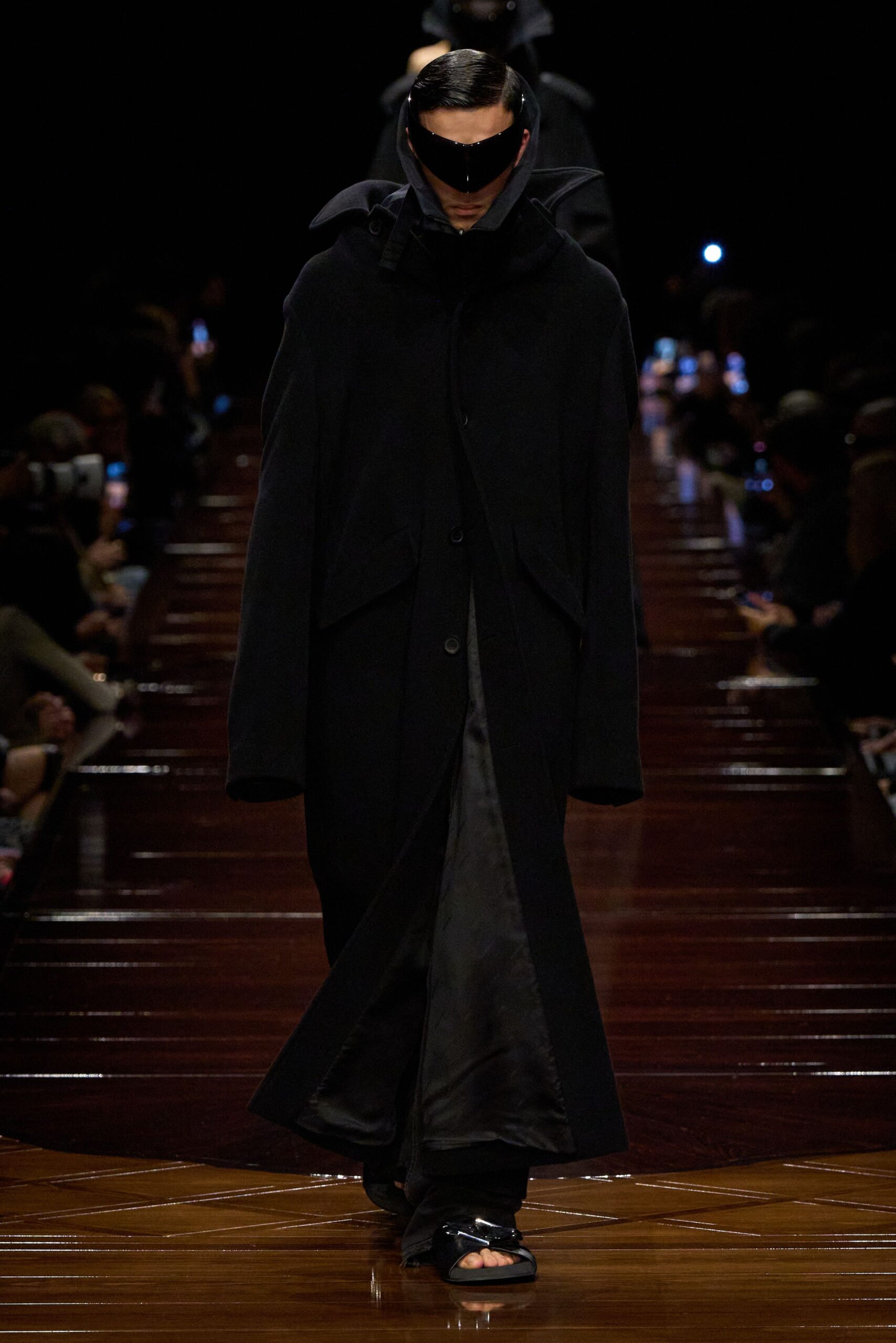 black wool long-sleeve collared oversized buttoned maxi coat