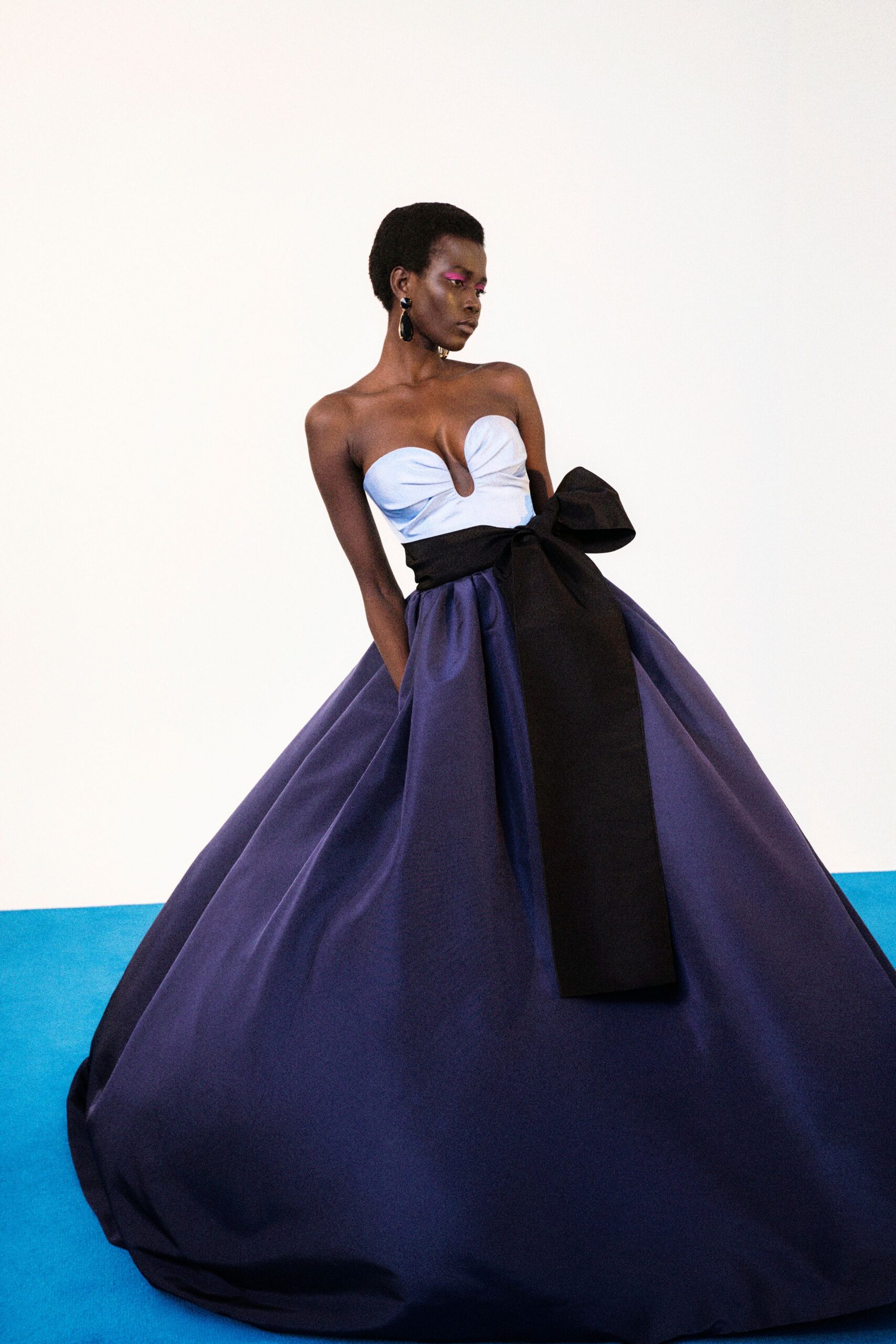 white and black strapless gown