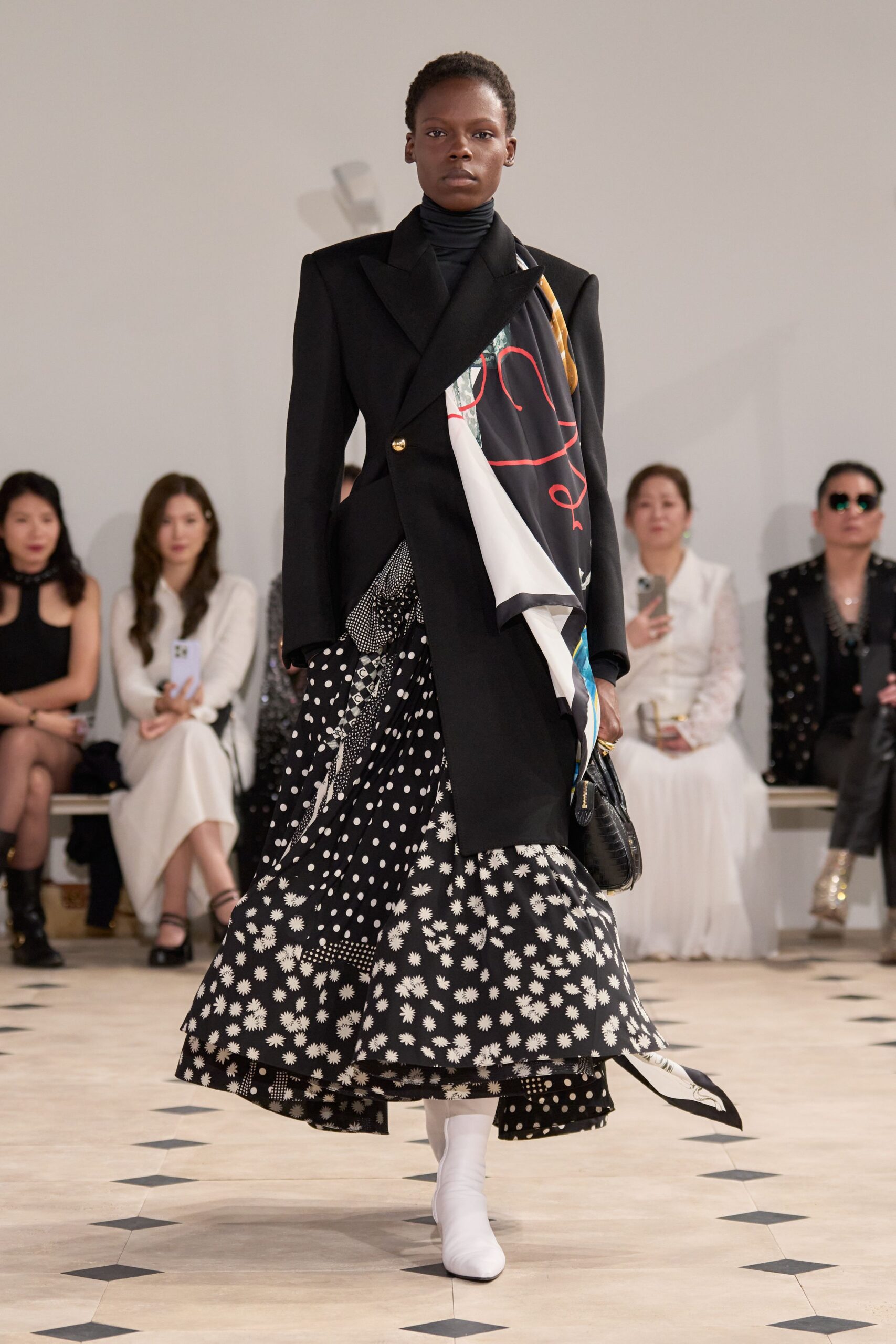 black blazer patterned skirt