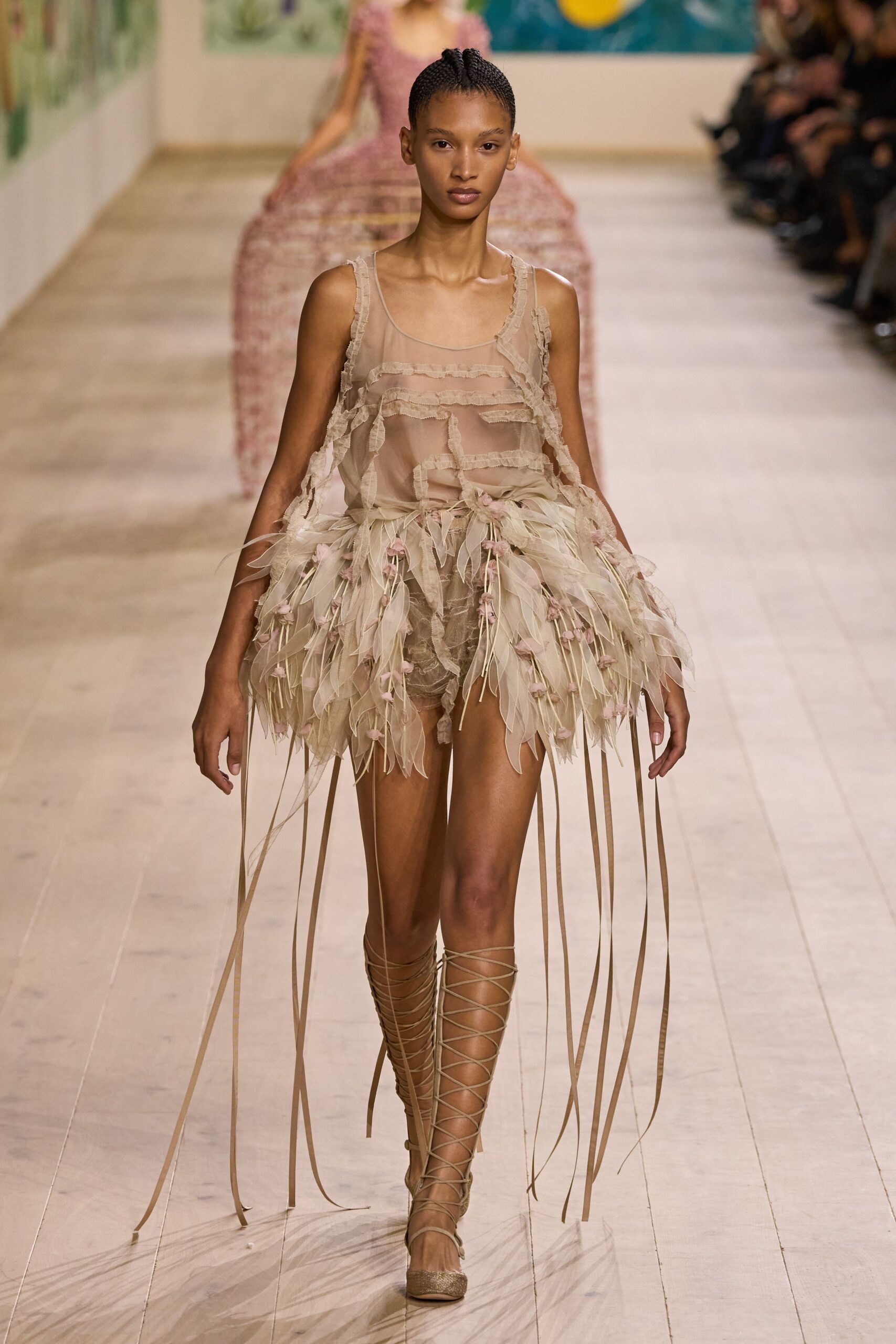 beige feather mini dress with laced shoes