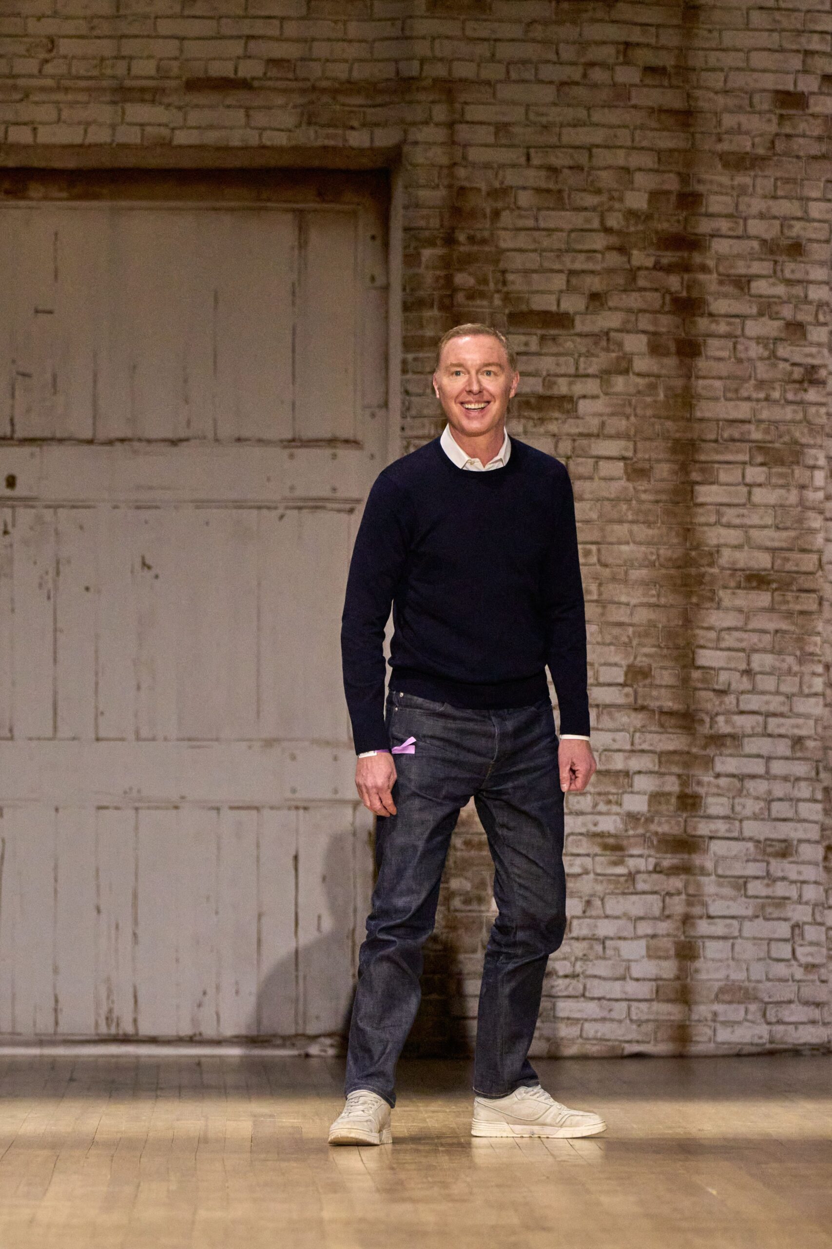 navy sweater with blue jeans