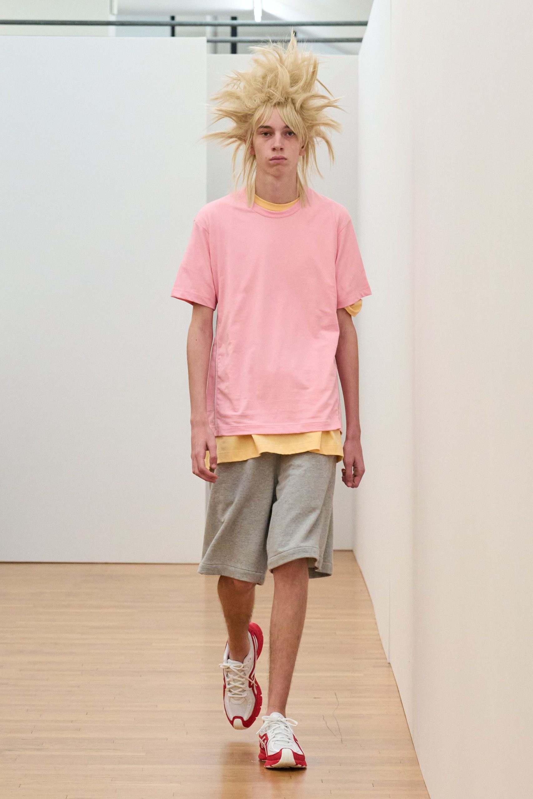 pink and yellow layered t-shirts with gray shorts