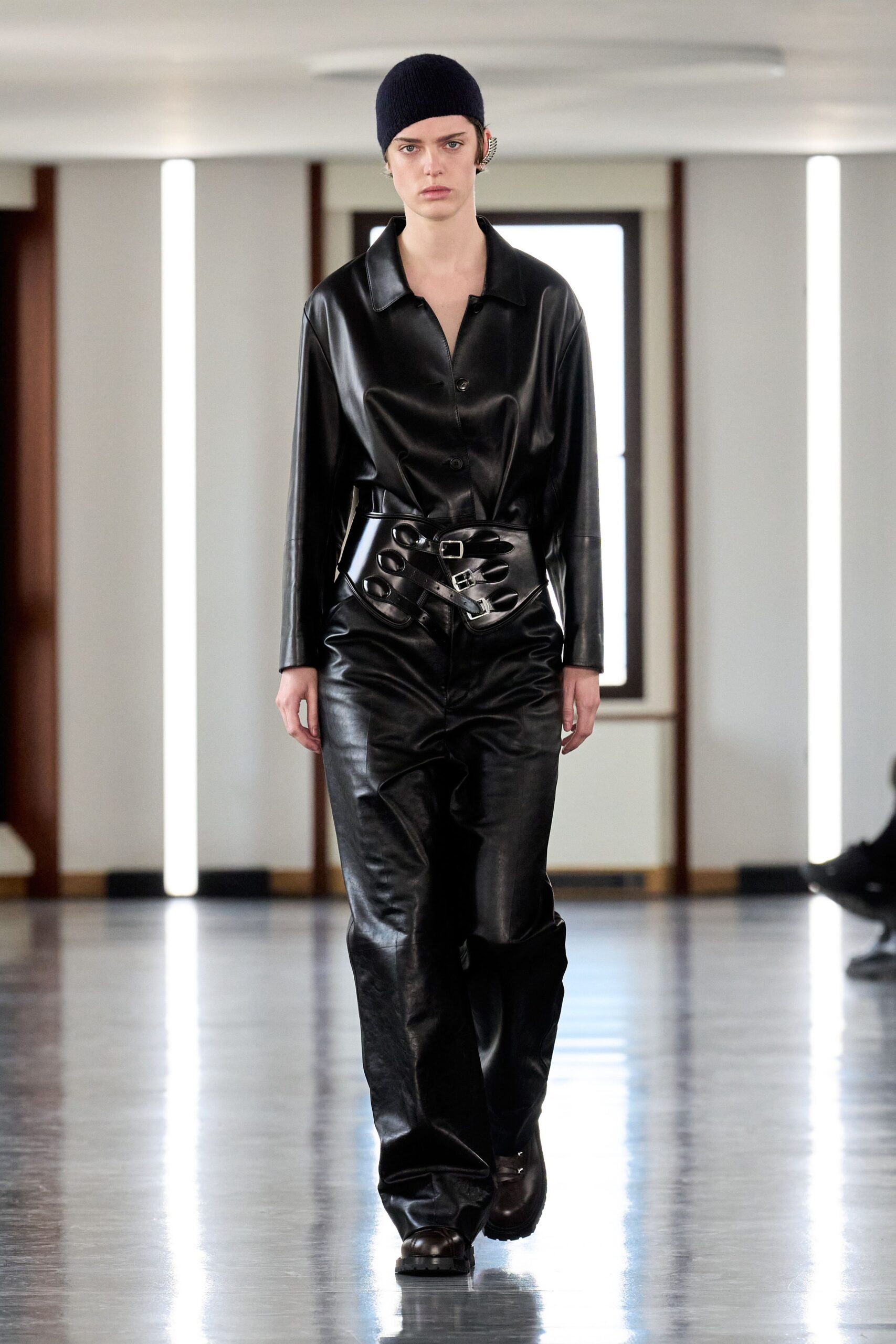 black leather long-sleeve collared fitted zippered pockets jumpsuit