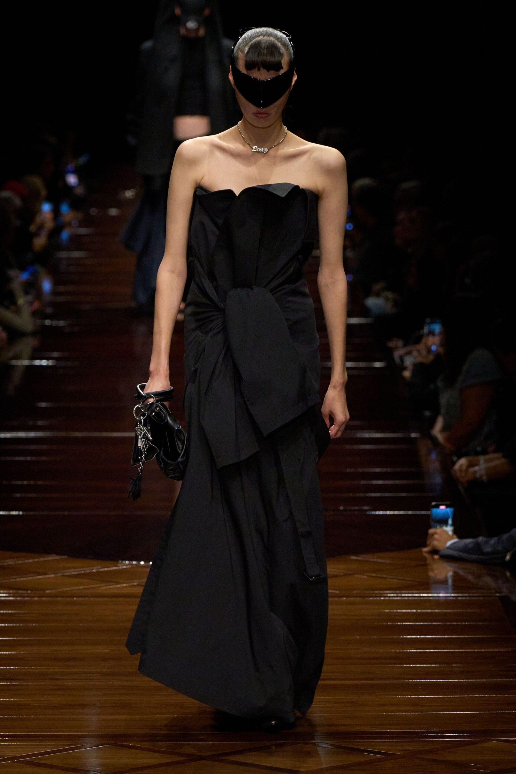 black strapless draped gown with bag