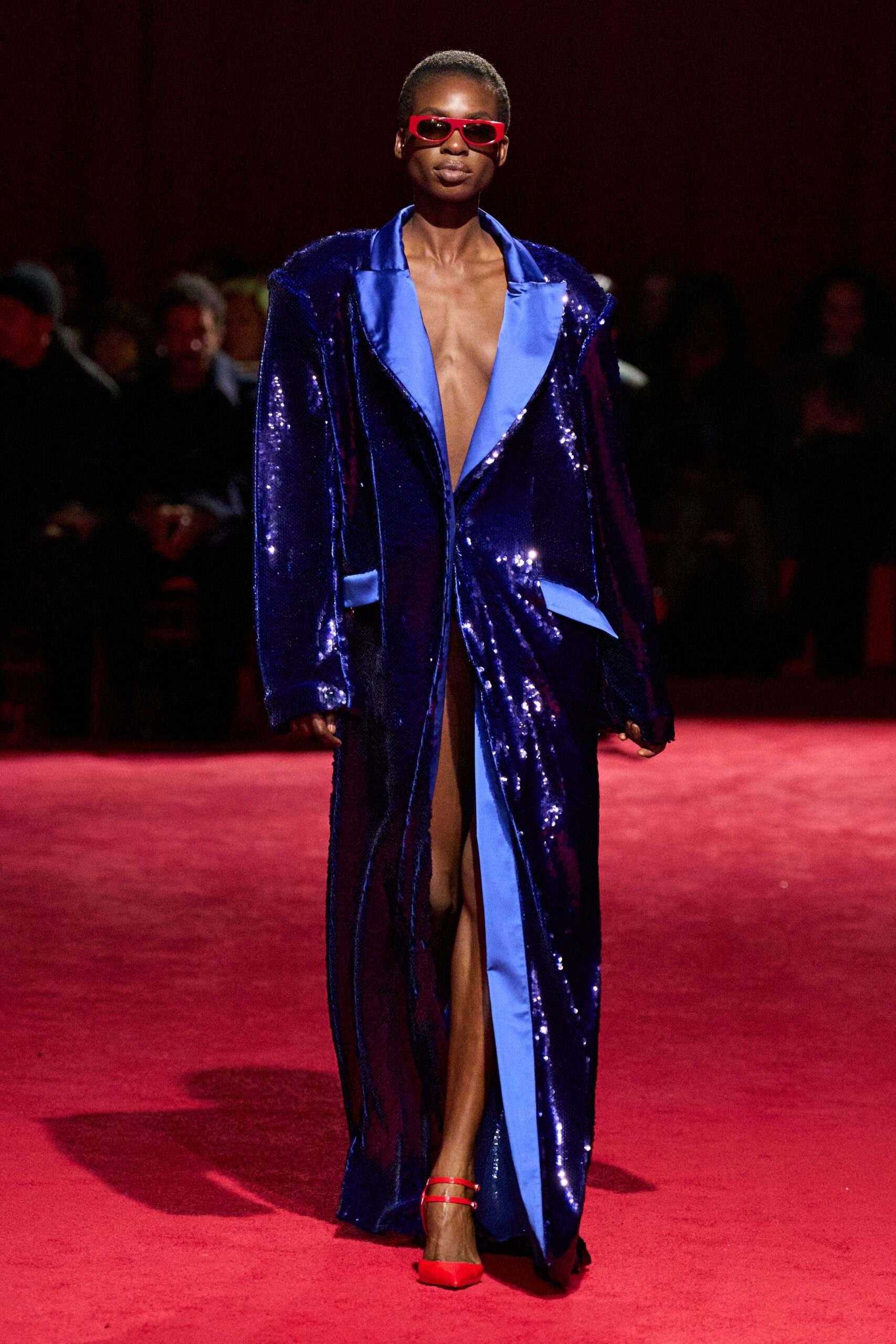 blue sequin gown with red shoes
