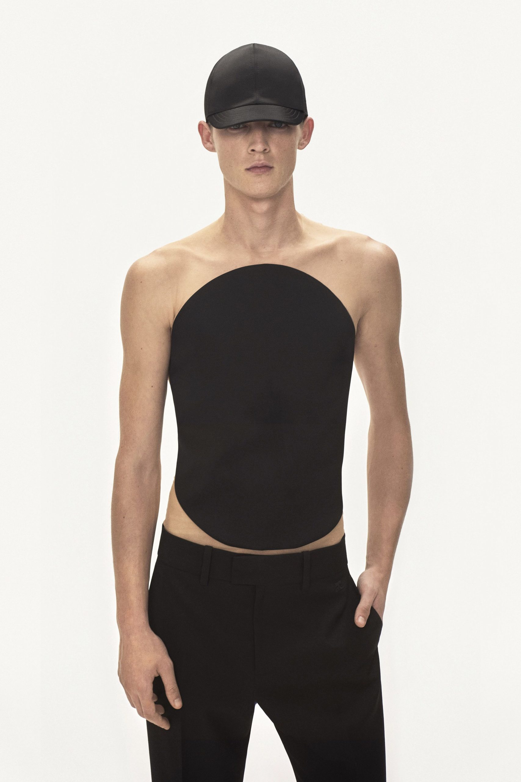 black fitted neoprene top with tailored pants