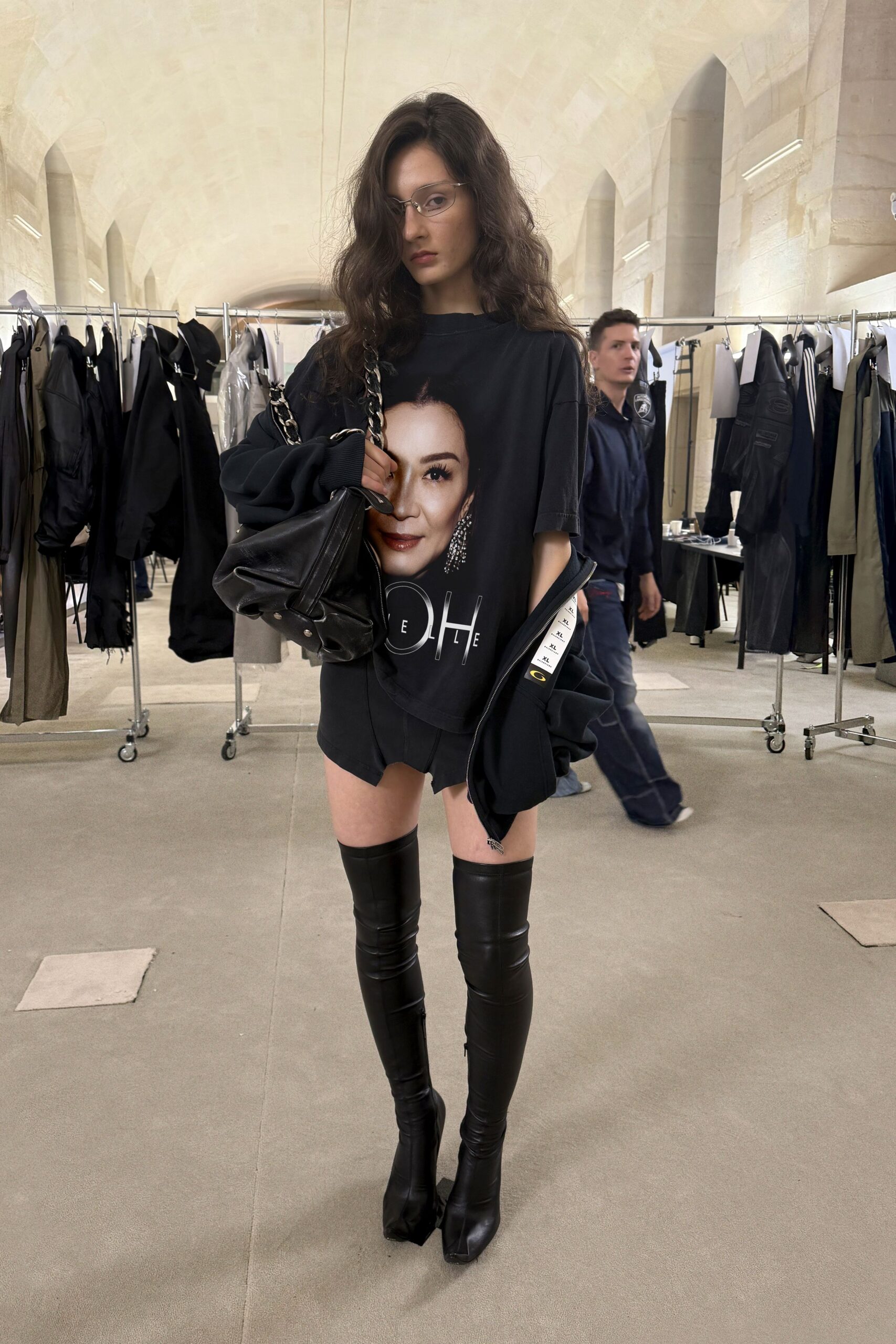 black oversized t-shirt with pleated skirt