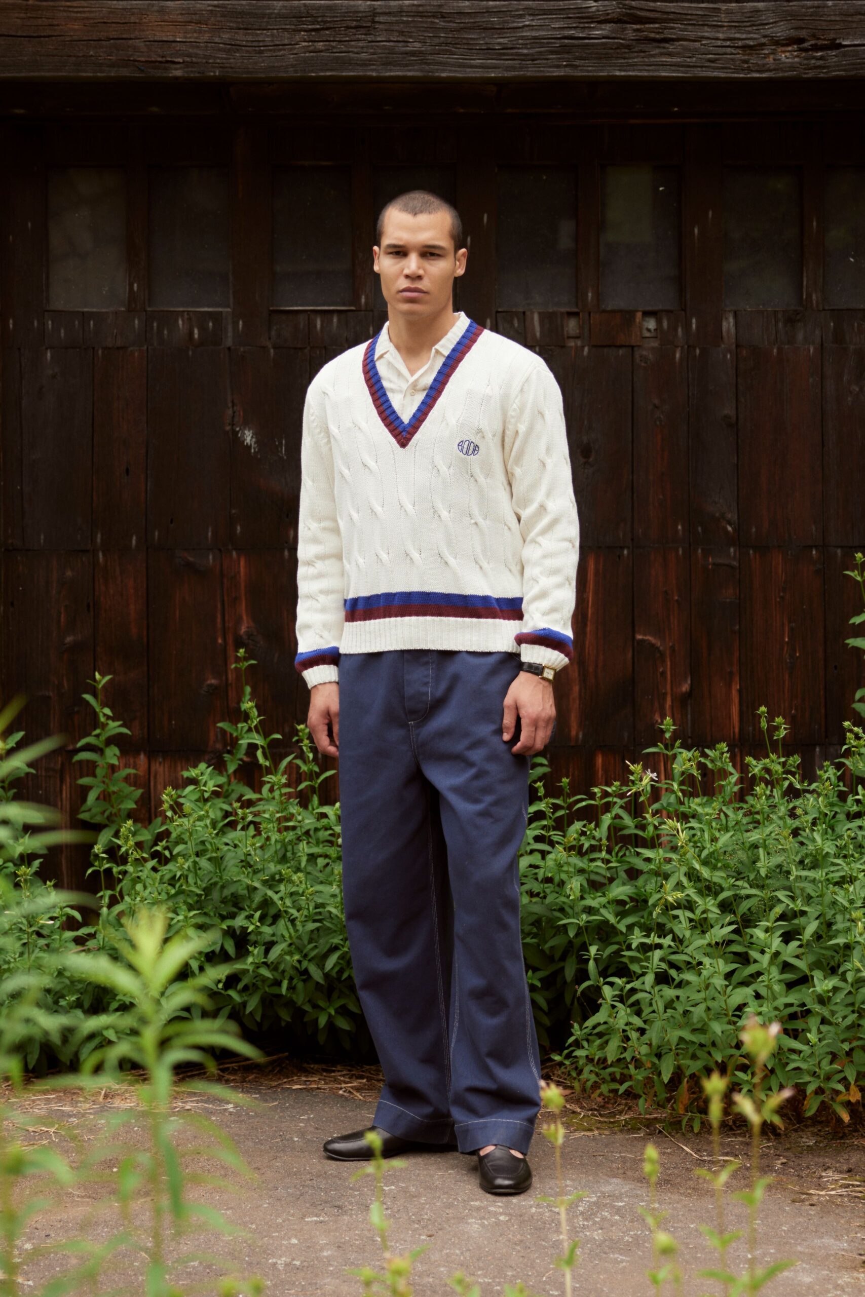 white relaxed sweater with blue pants