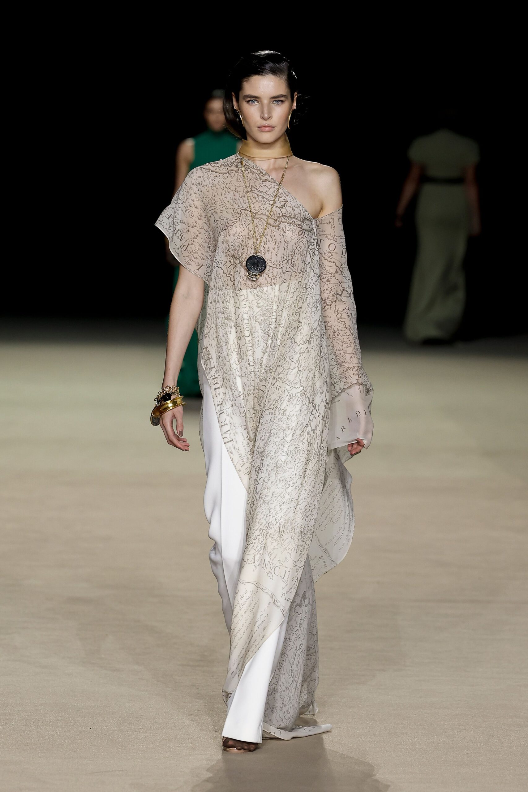 beige silk sleeveless off-shoulder relaxed draped flowing gown