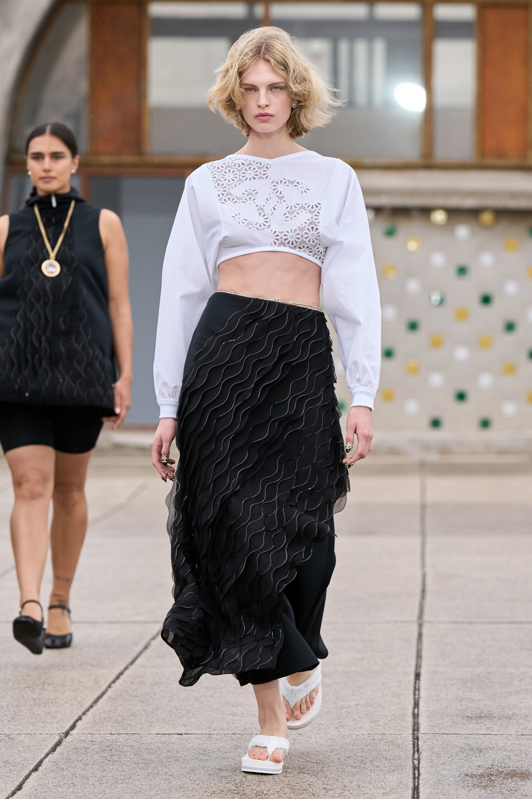 white cropped top black midi skirt