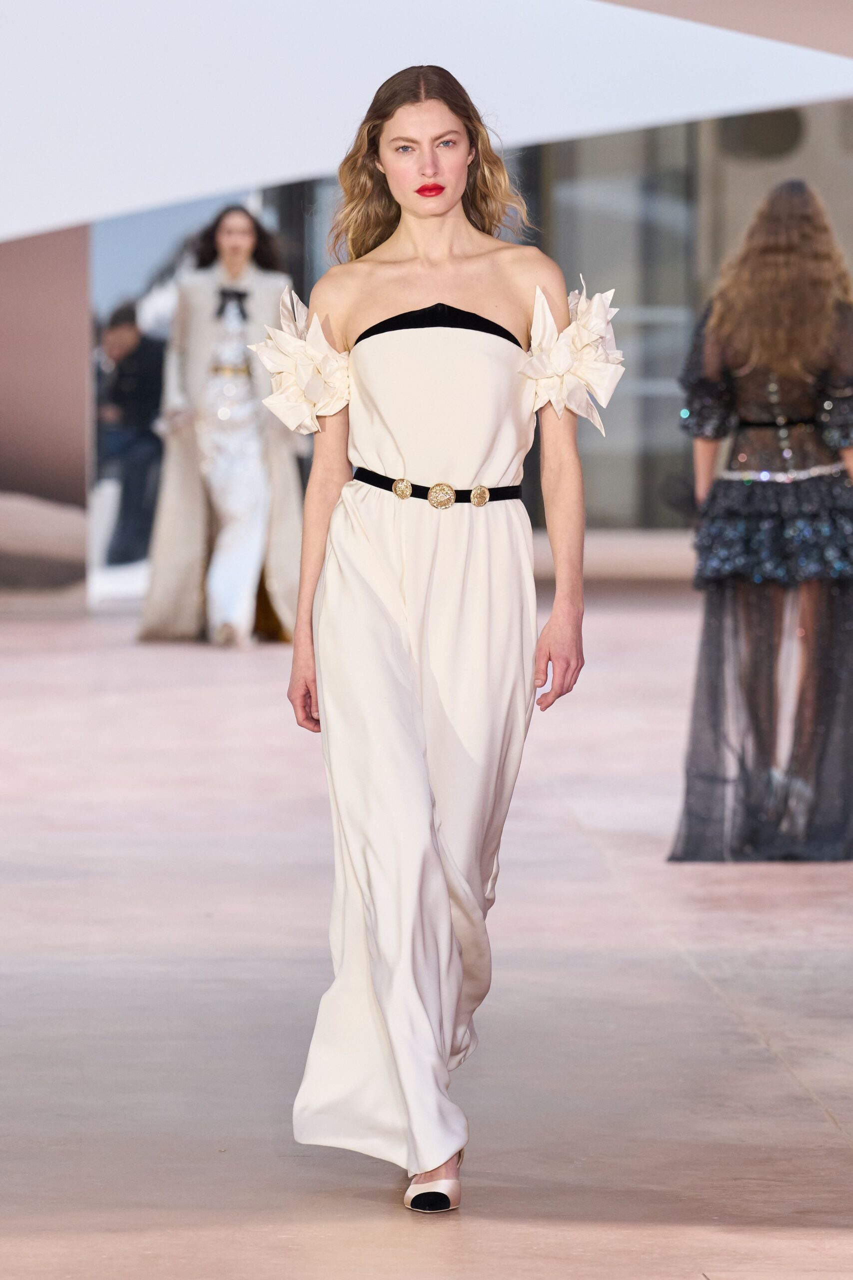 white silk off-shoulder fitted pleated maxi gown