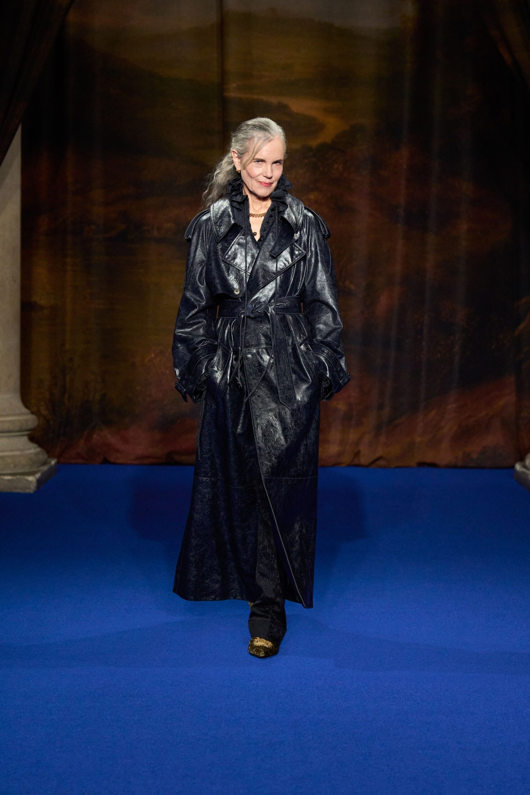 black leather long-sleeve collared fitted belted layered coat