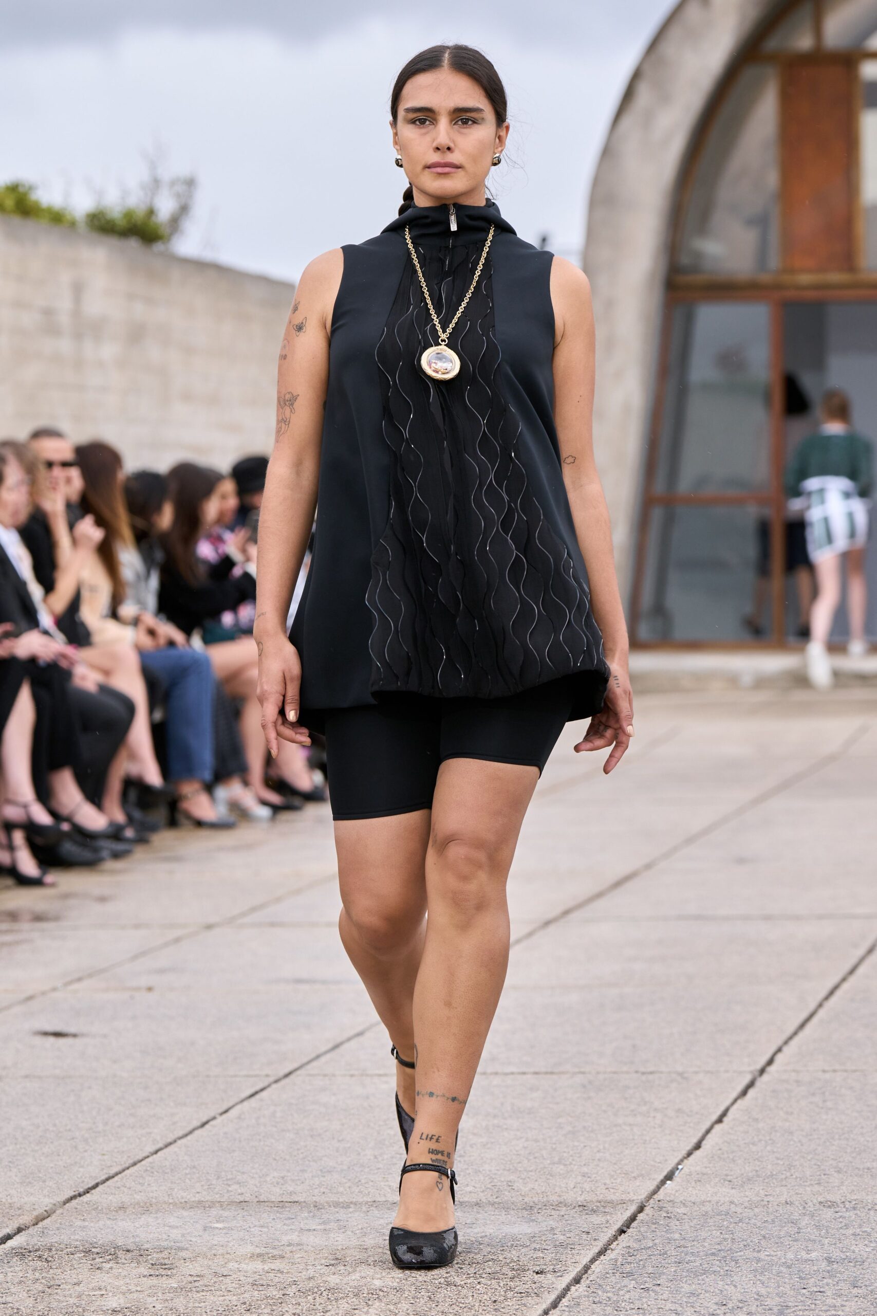 black sleeveless top with shorts