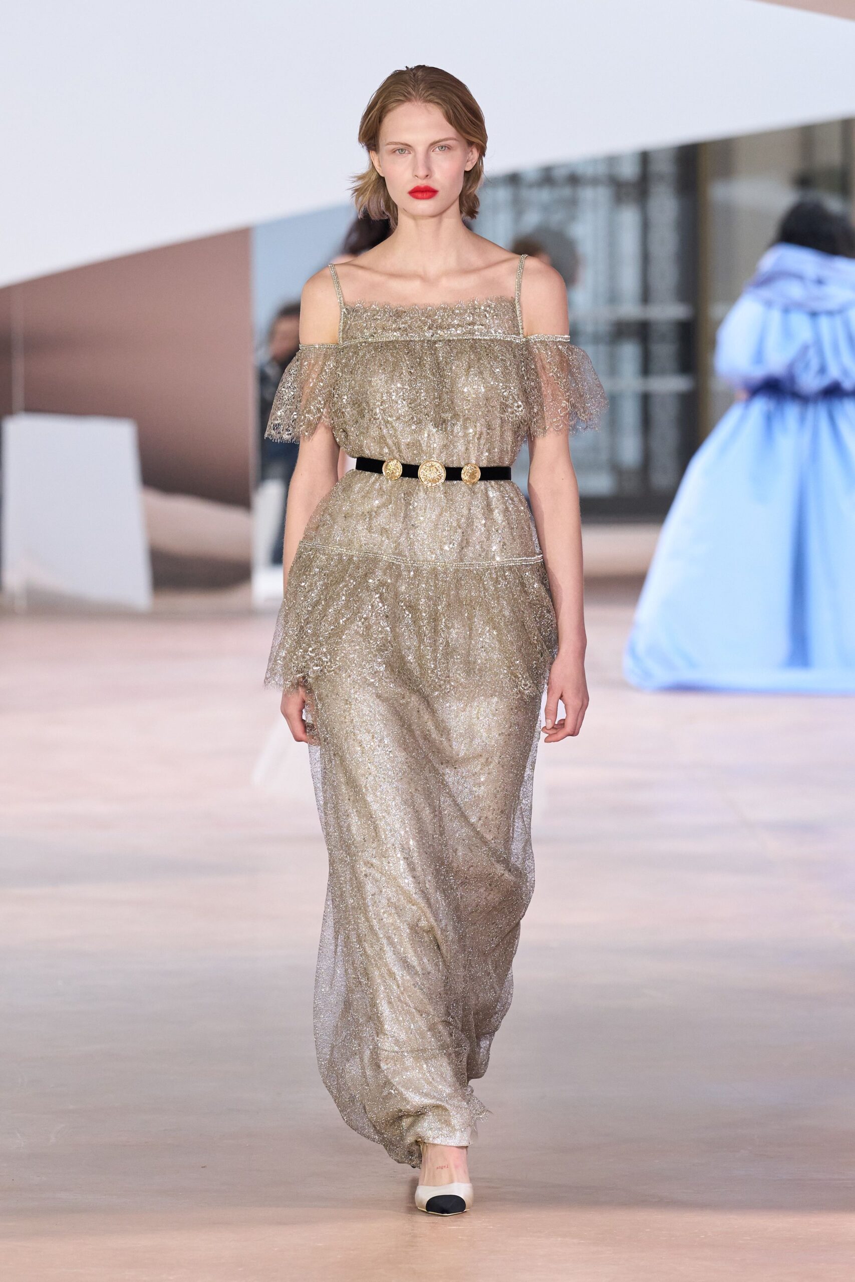 gold silk sleeveless off-shoulder fitted layered pleated gown