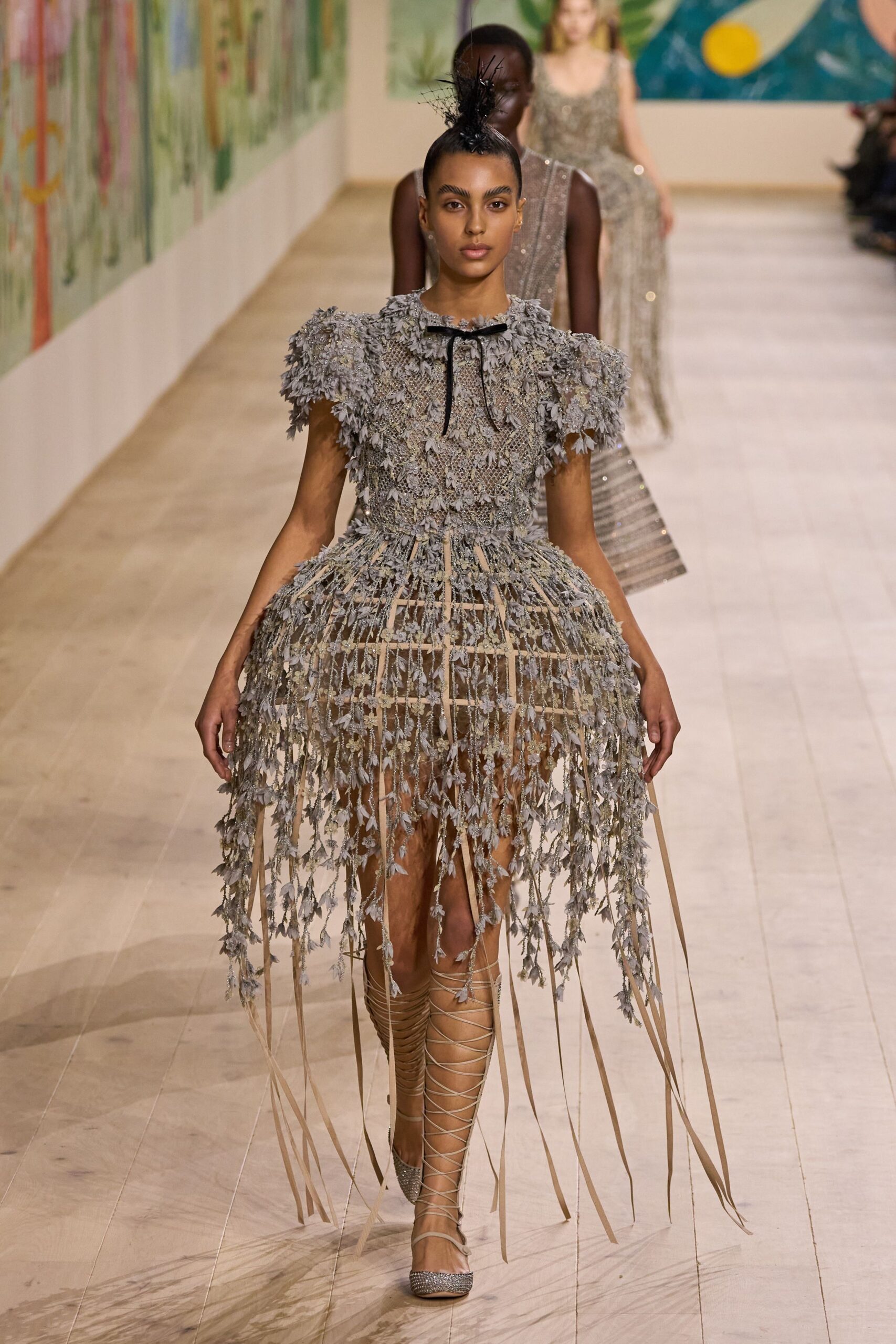 gray silk sleeveless high-neck fitted ruffled tiered dress