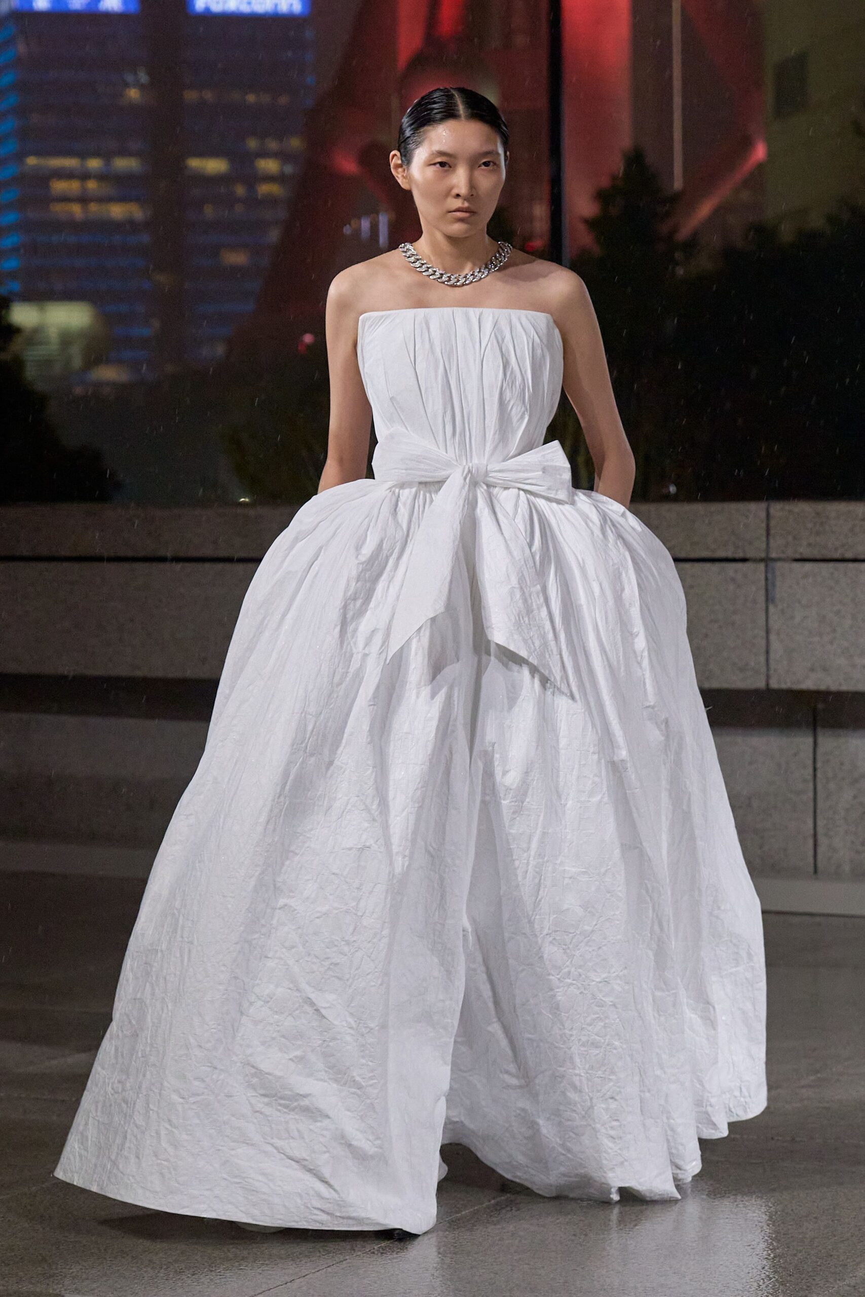 white pleated strapless gown