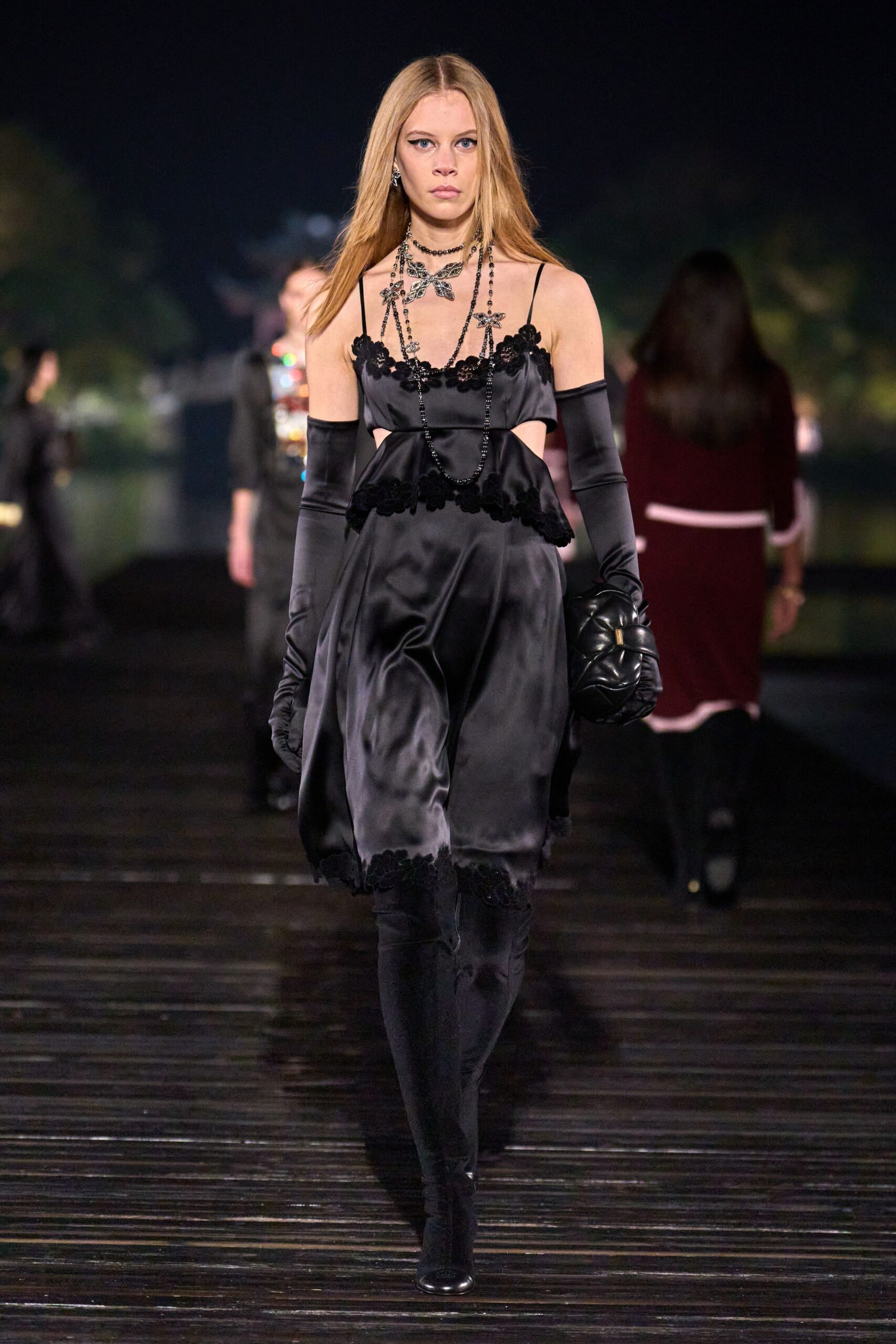 black silk fitted dress with gloves and boots