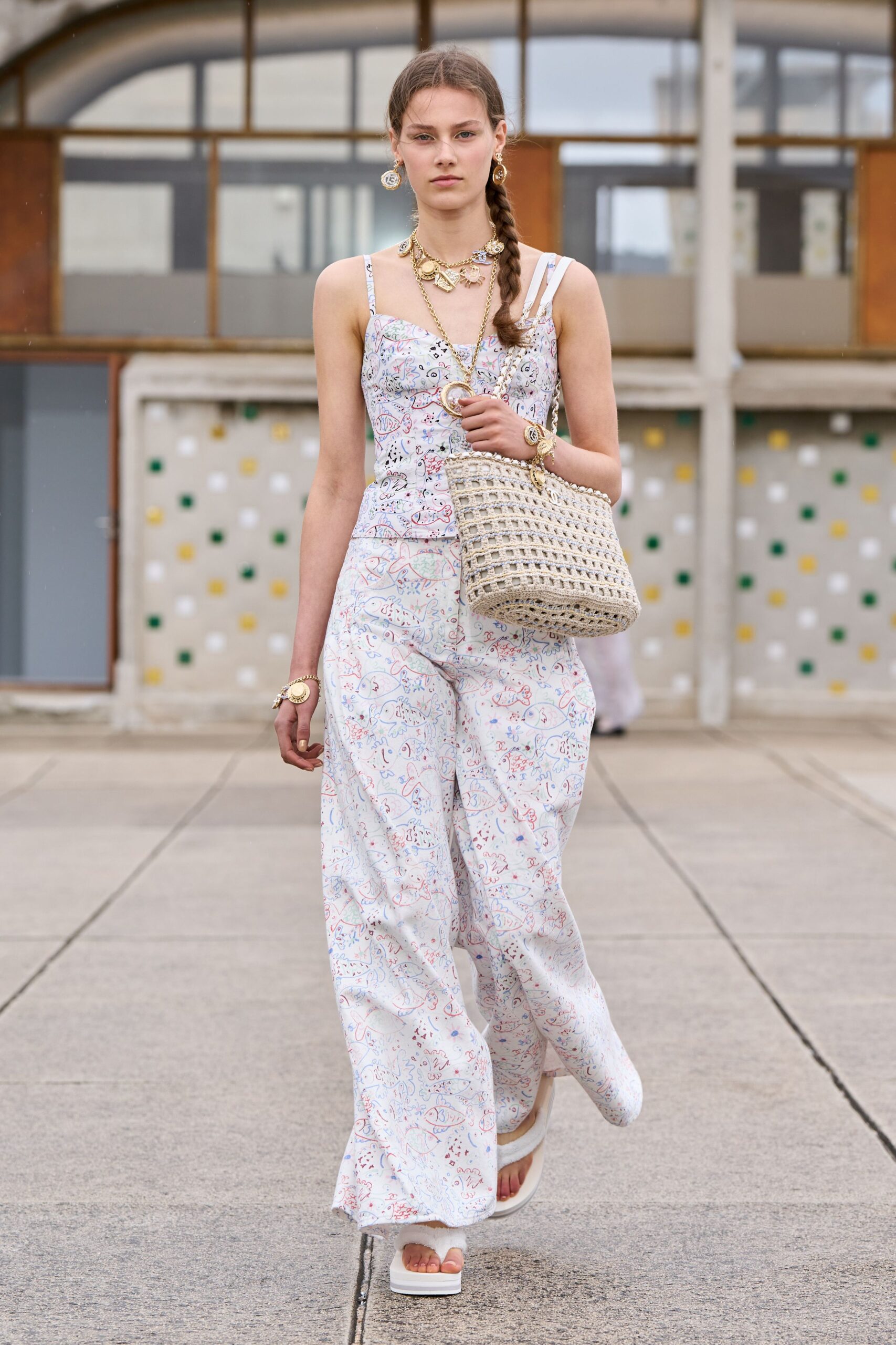 white cotton sleeveless v-neck relaxed printed jumpsuit