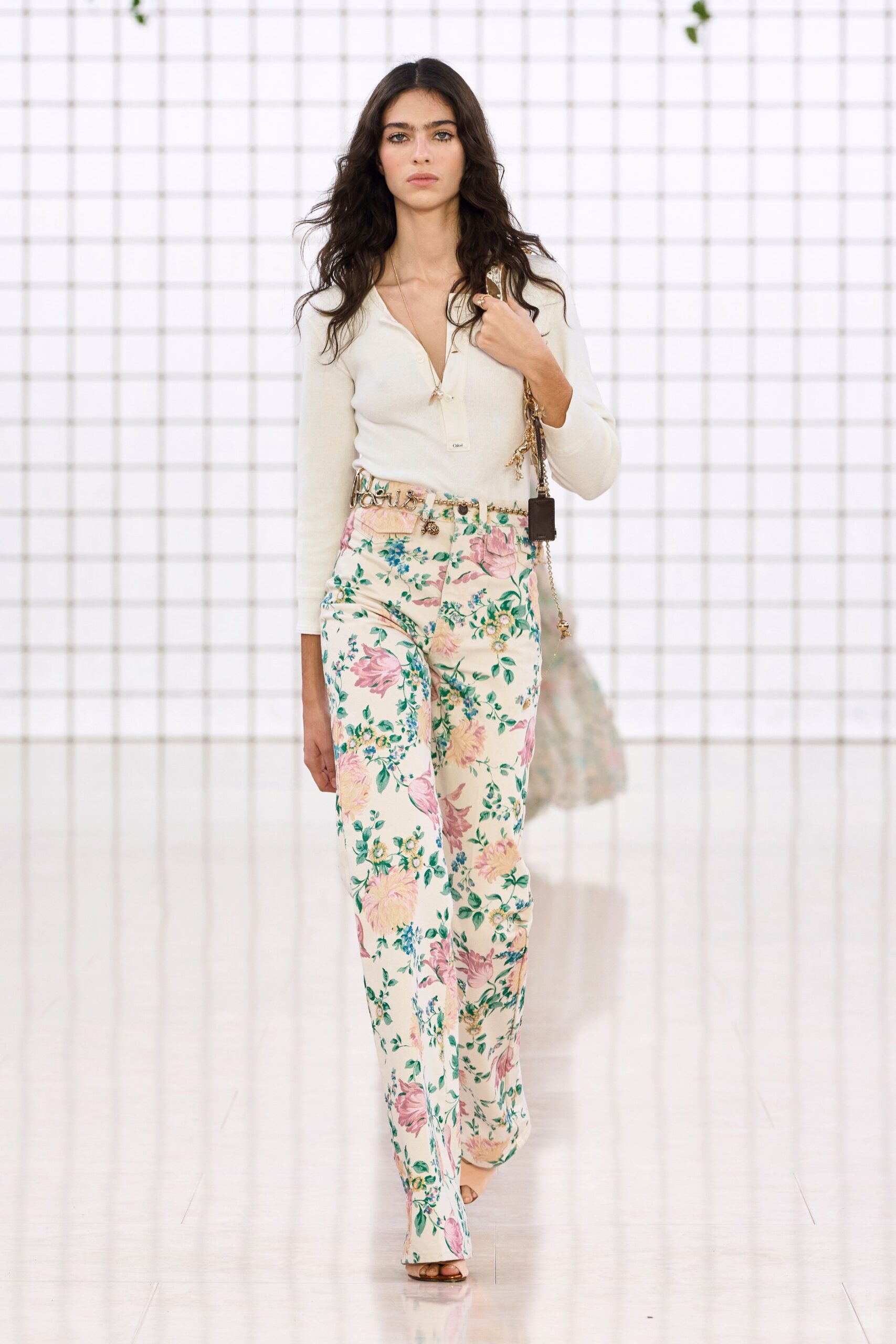 white fitted top with floral pants