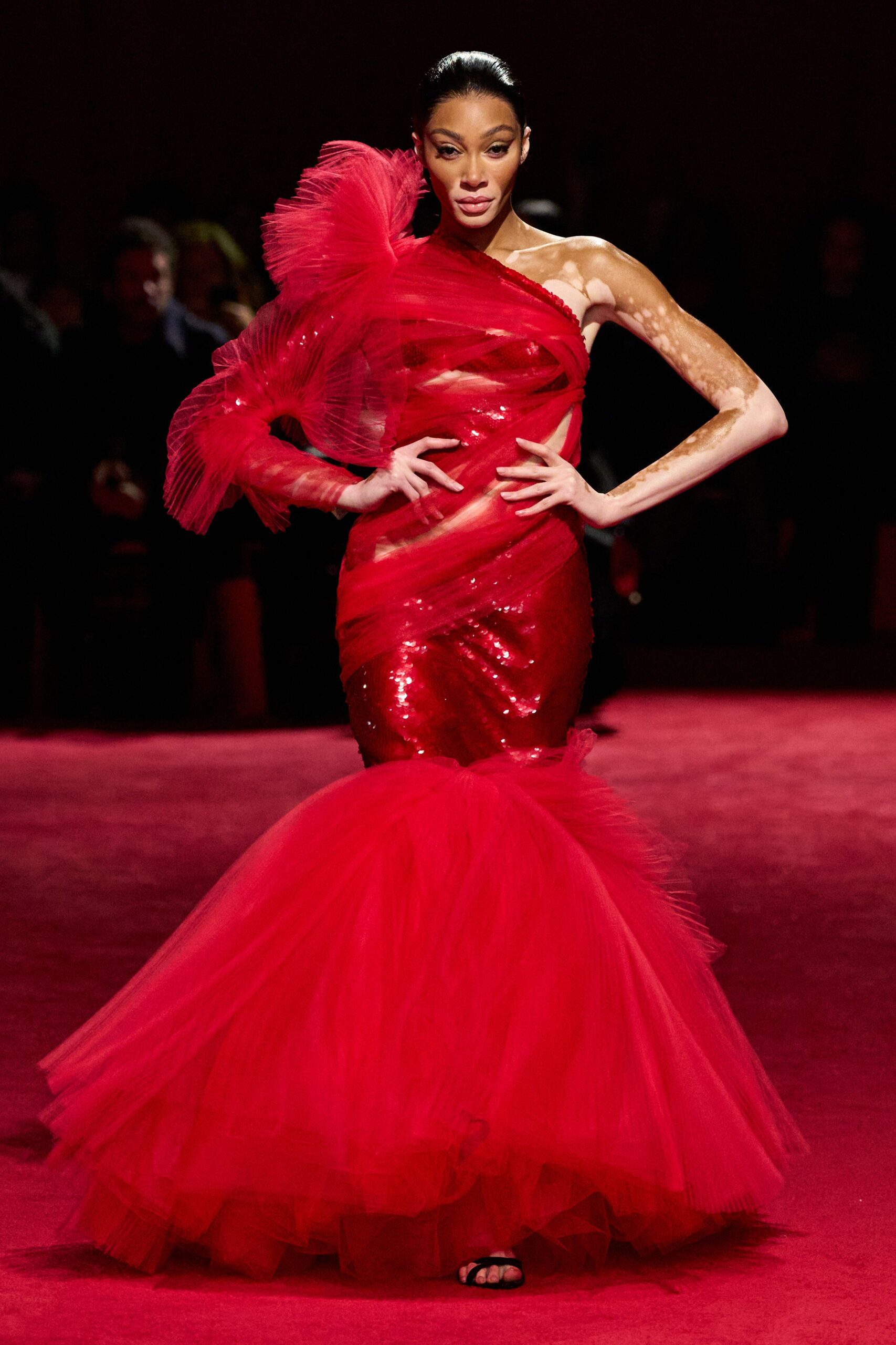 red sequined off-shoulder gown