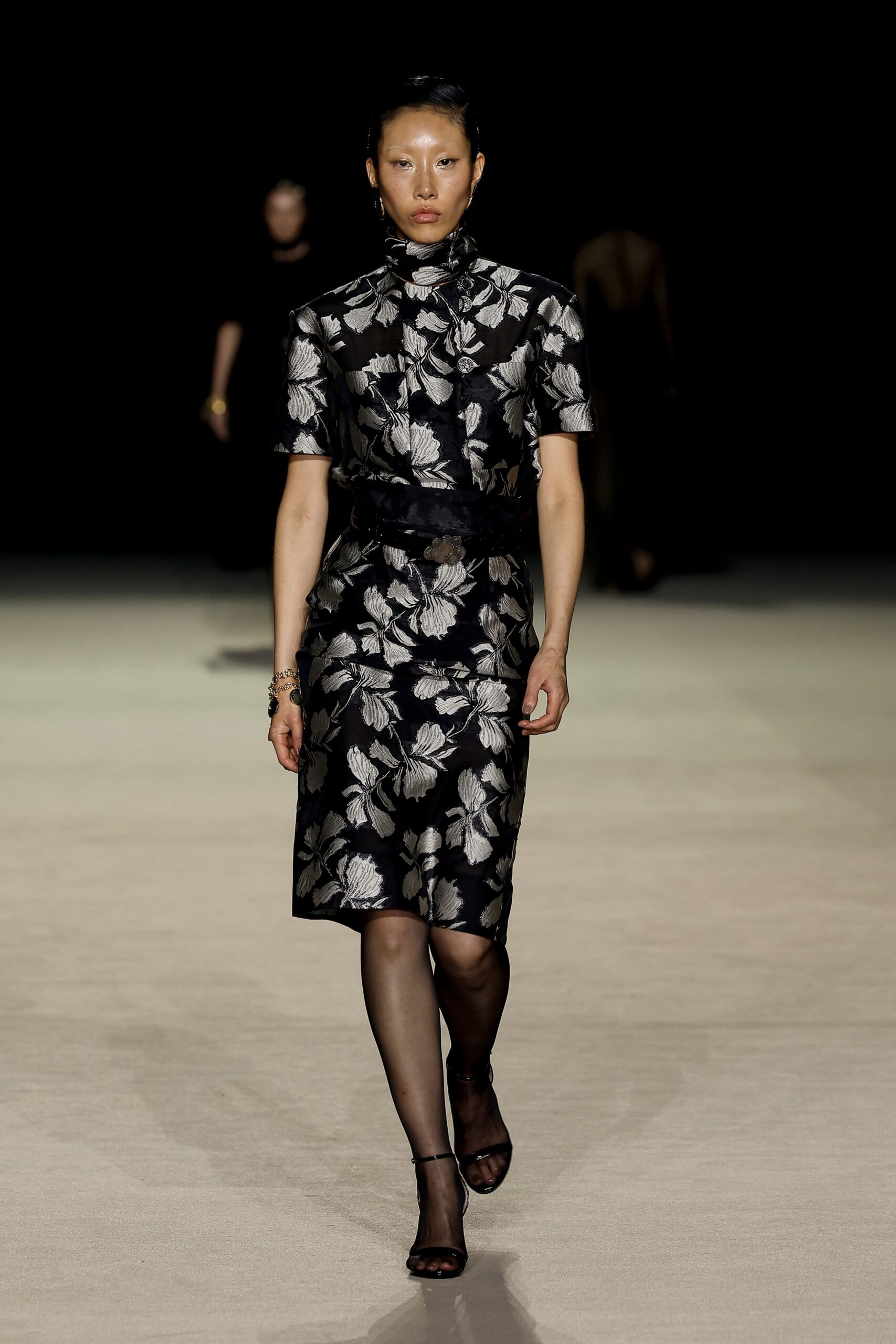 black floral midi dress with strappy shoes