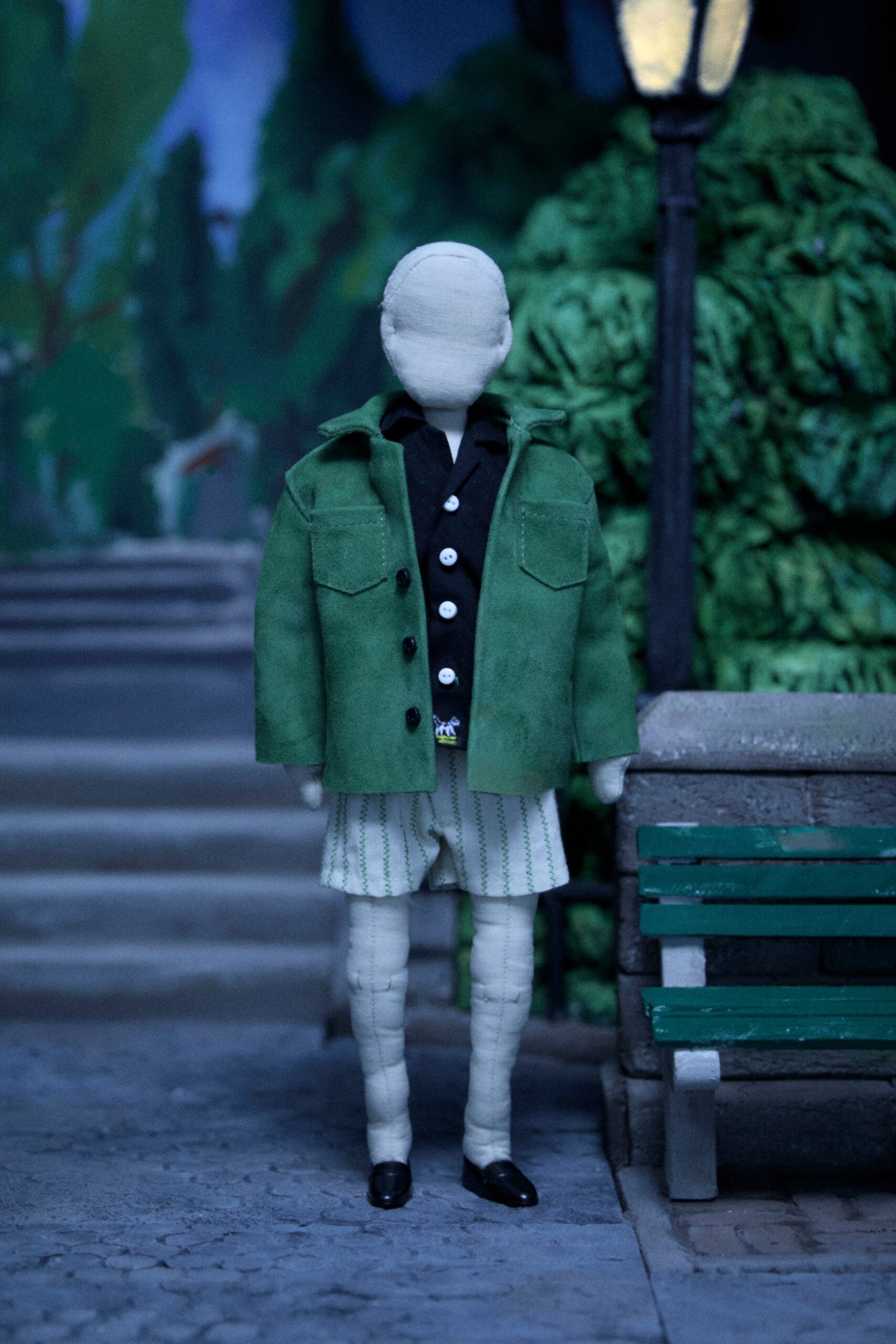 green suede jacket black shirt white shorts