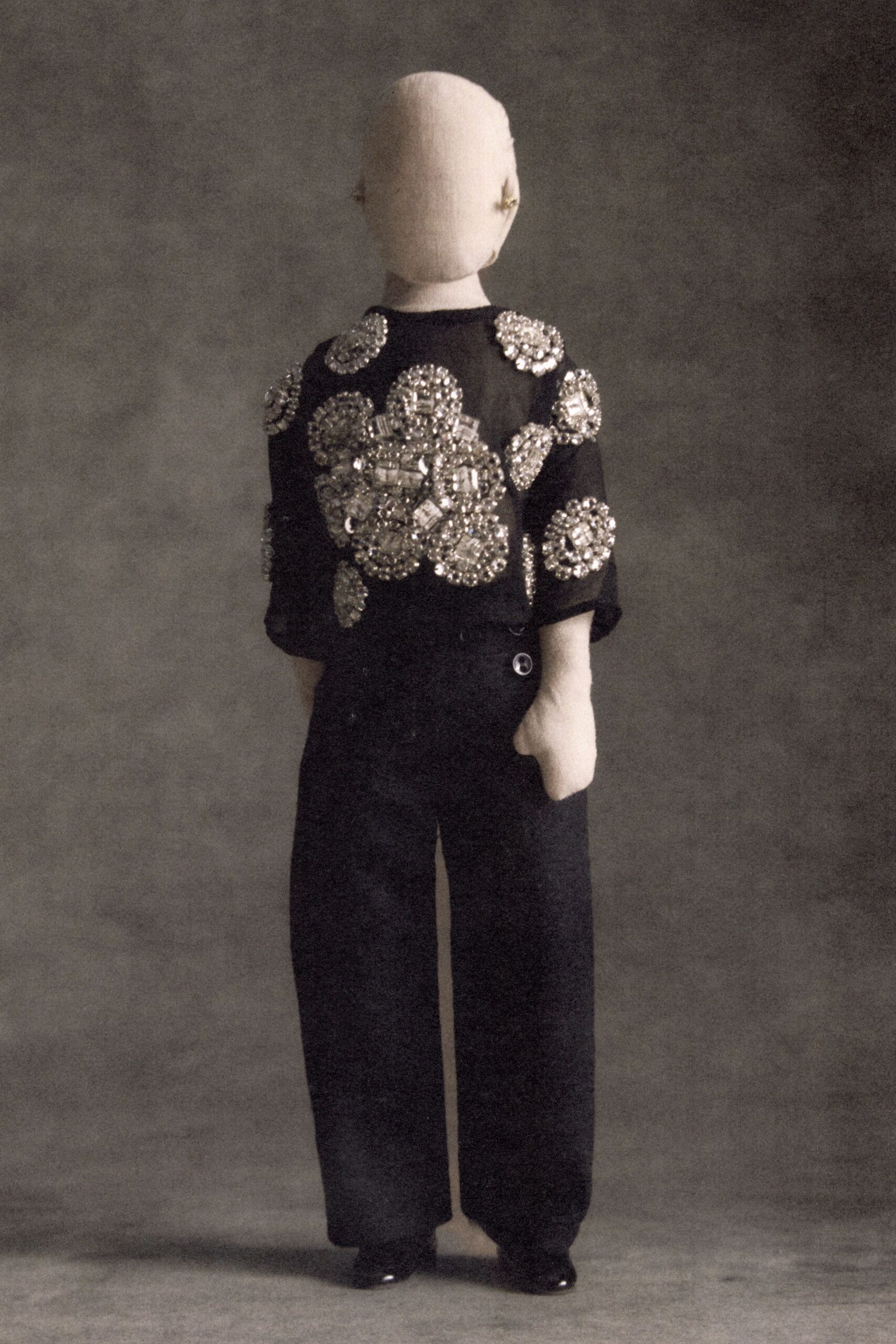 black embellished blouse with wide-leg pants