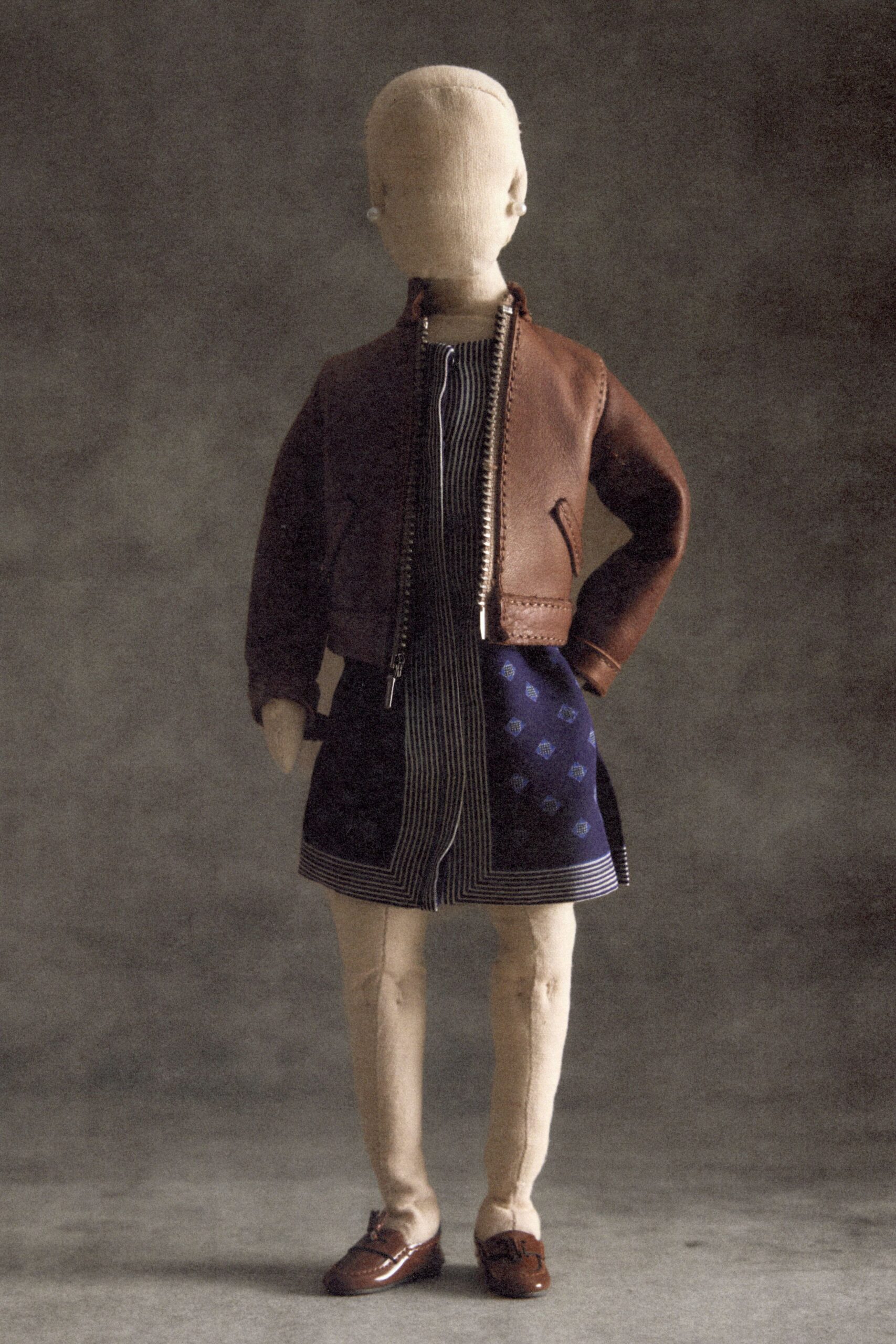 brown leather long-sleeve collared structured zippered pockets jacket