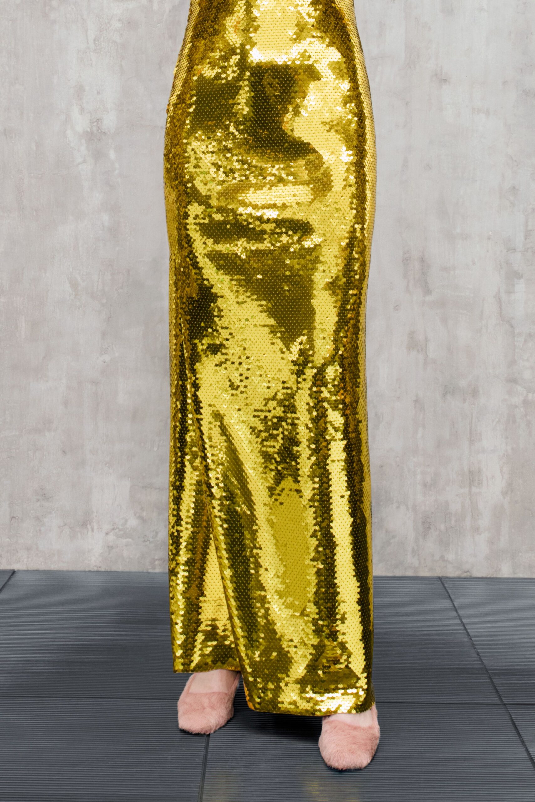 gold sequin maxi gown with pink shoes