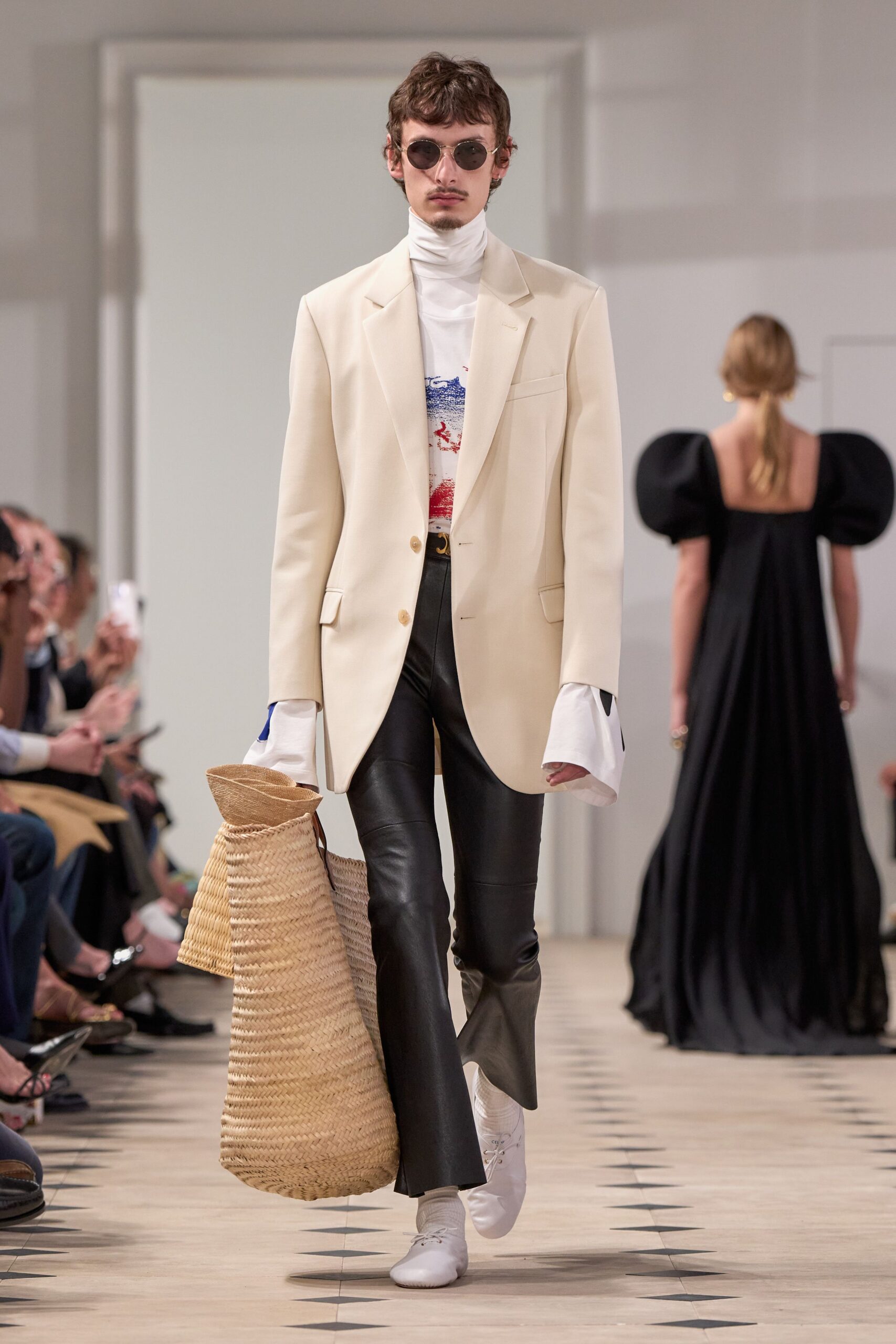 beige blazer with black leather pants