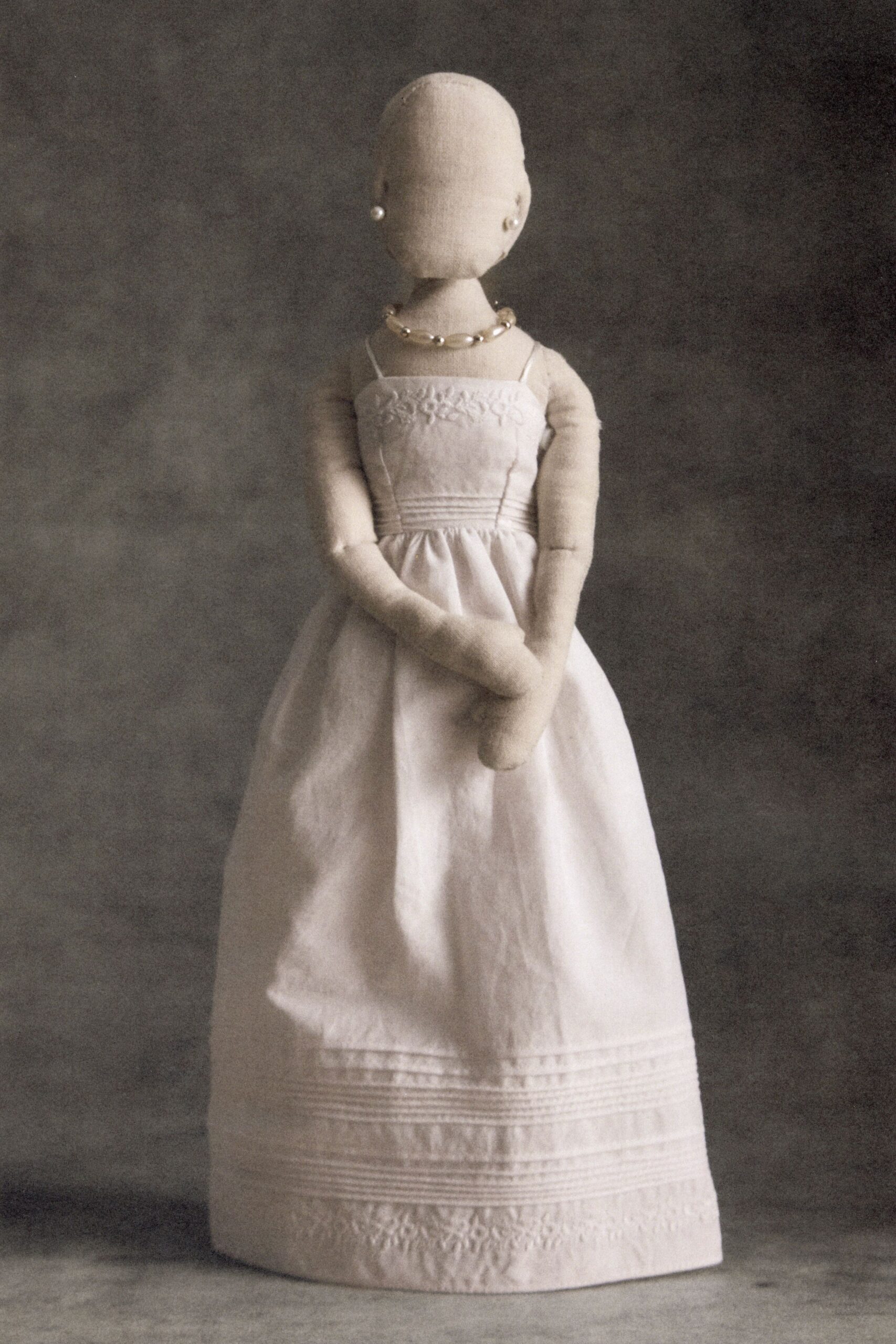 white cotton sleeveless square-neck structured embroidered pleated dress