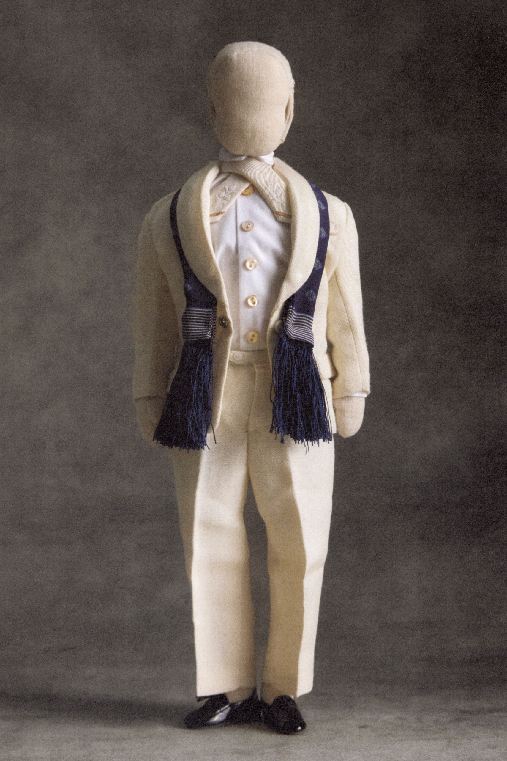 white wool long-sleeve collared structured buttoned layered jacket