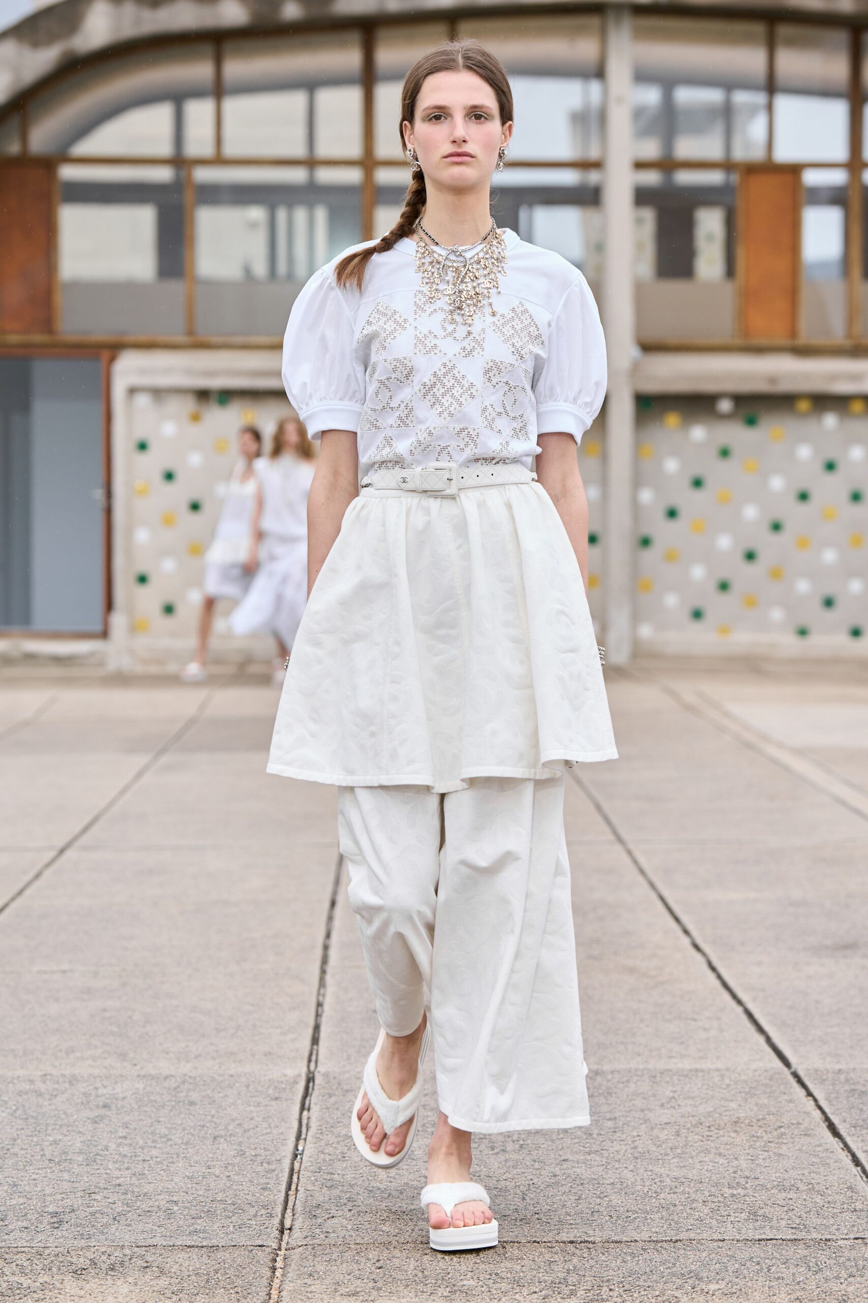 white embroidered top with layered skirt