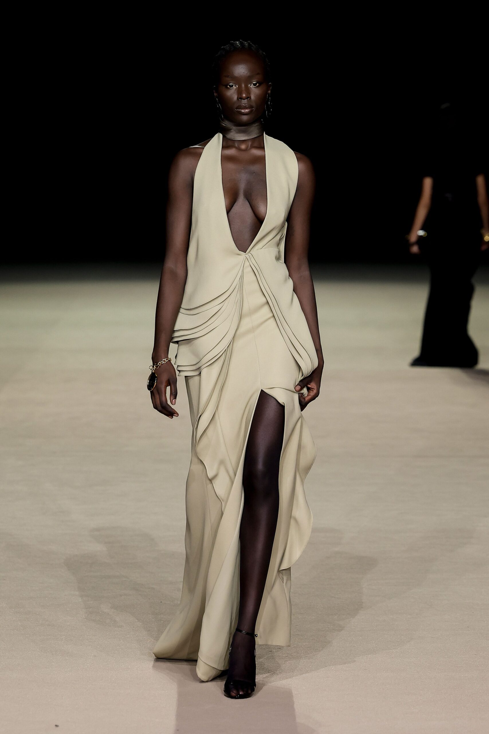 beige silk sleeveless v-neck fitted draped flowing gown