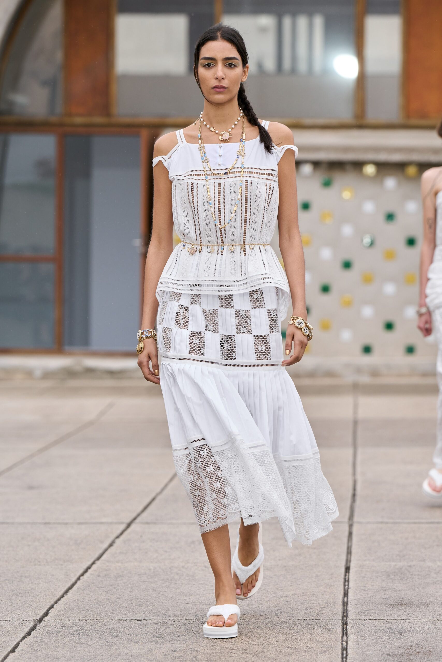 white cotton sleeveless off-shoulder fitted pleated layered dress