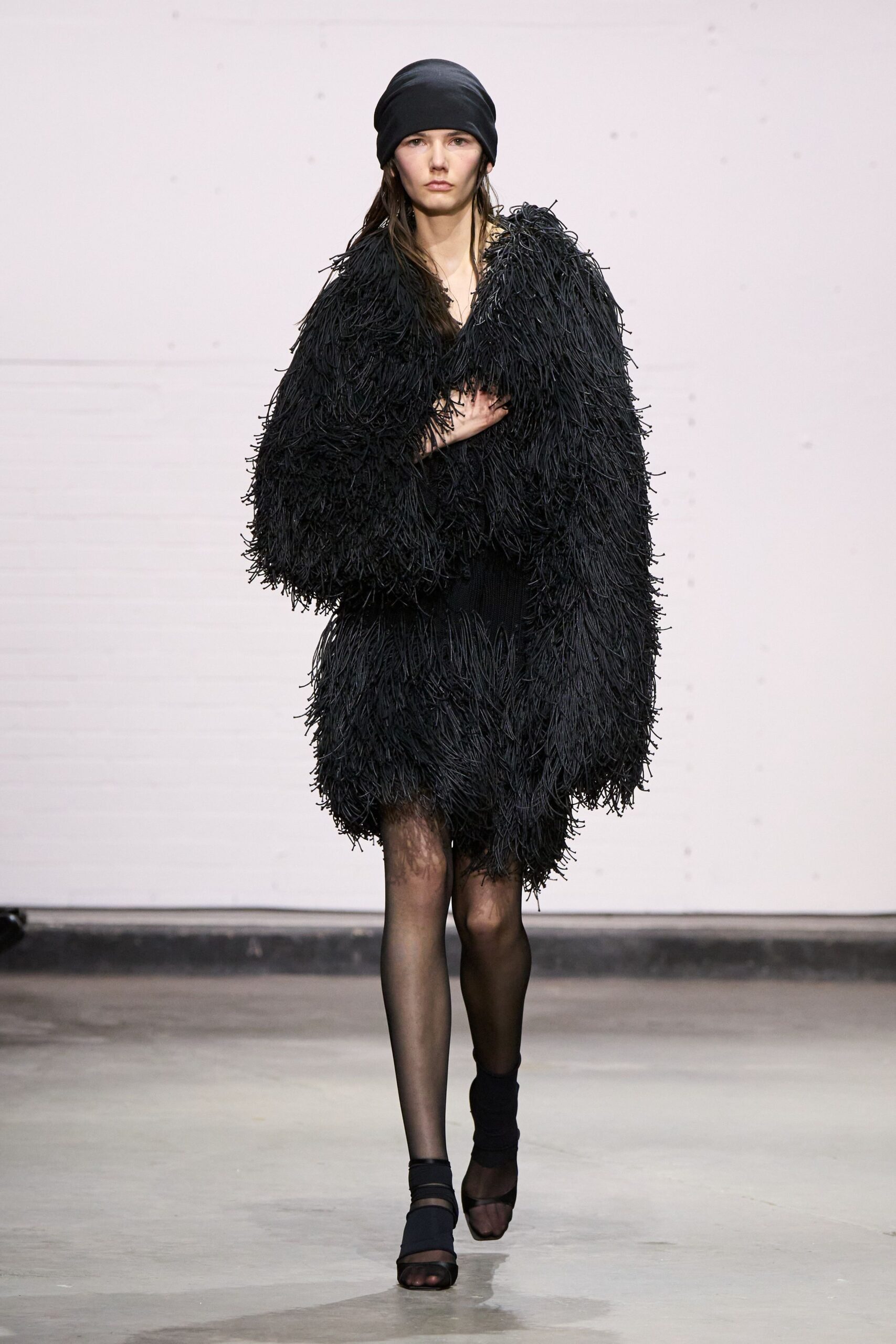 black fringed dress with hat