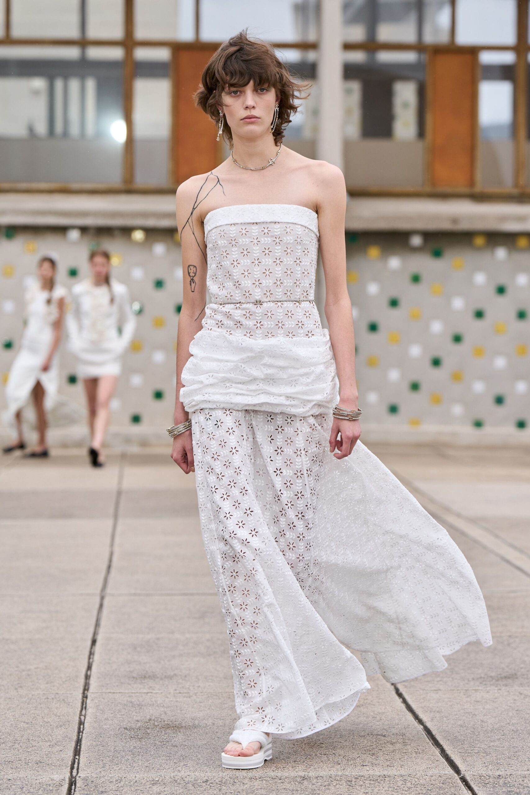 white cotton strapless fitted embroidered layered flowing gown