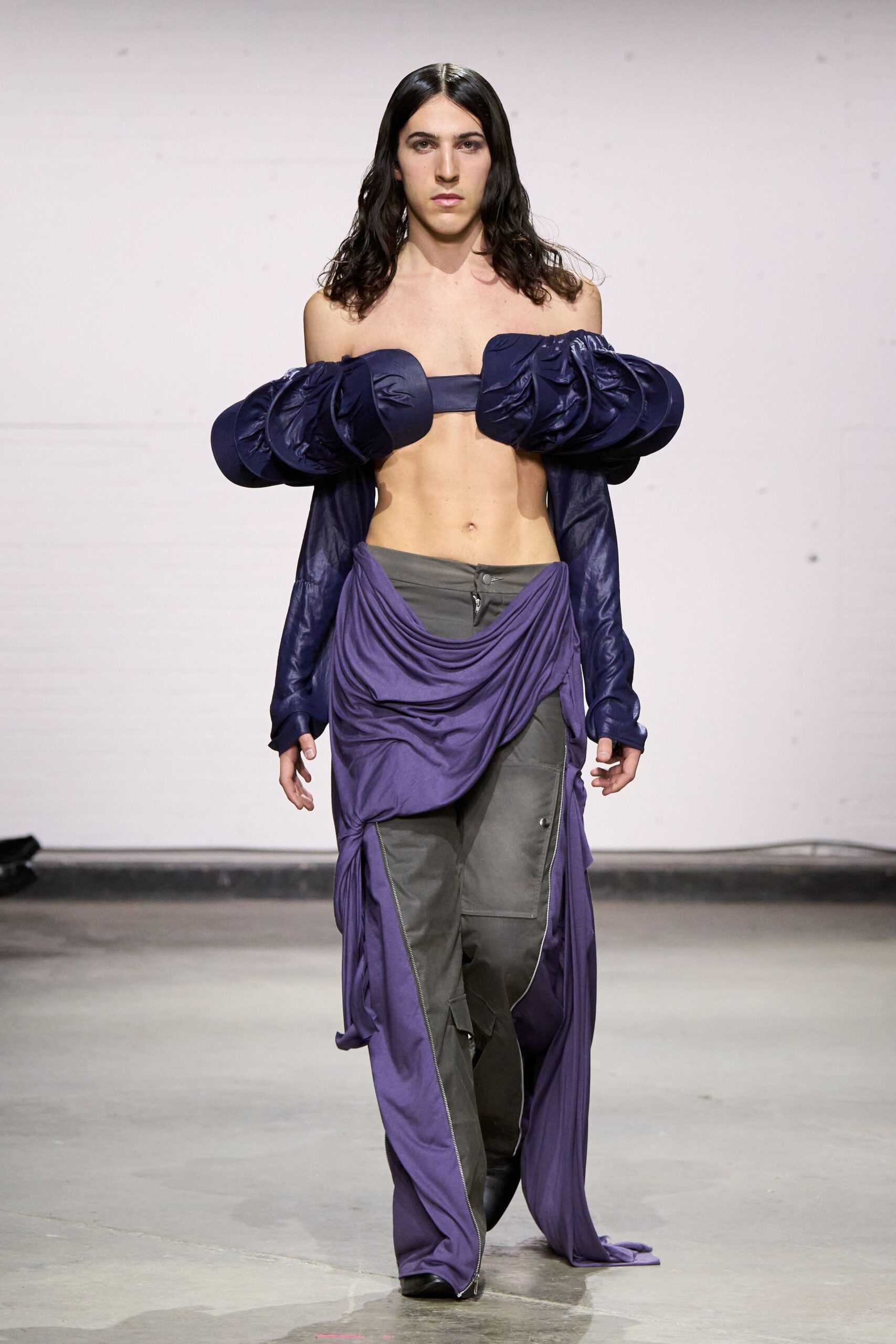 purple off-shoulder top and gray pants