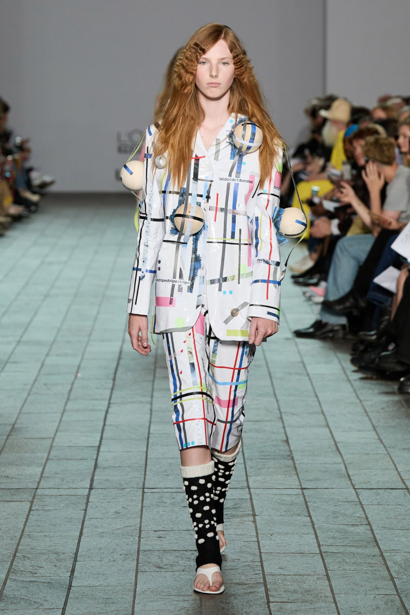 colorful printed suit with polka-dot socks