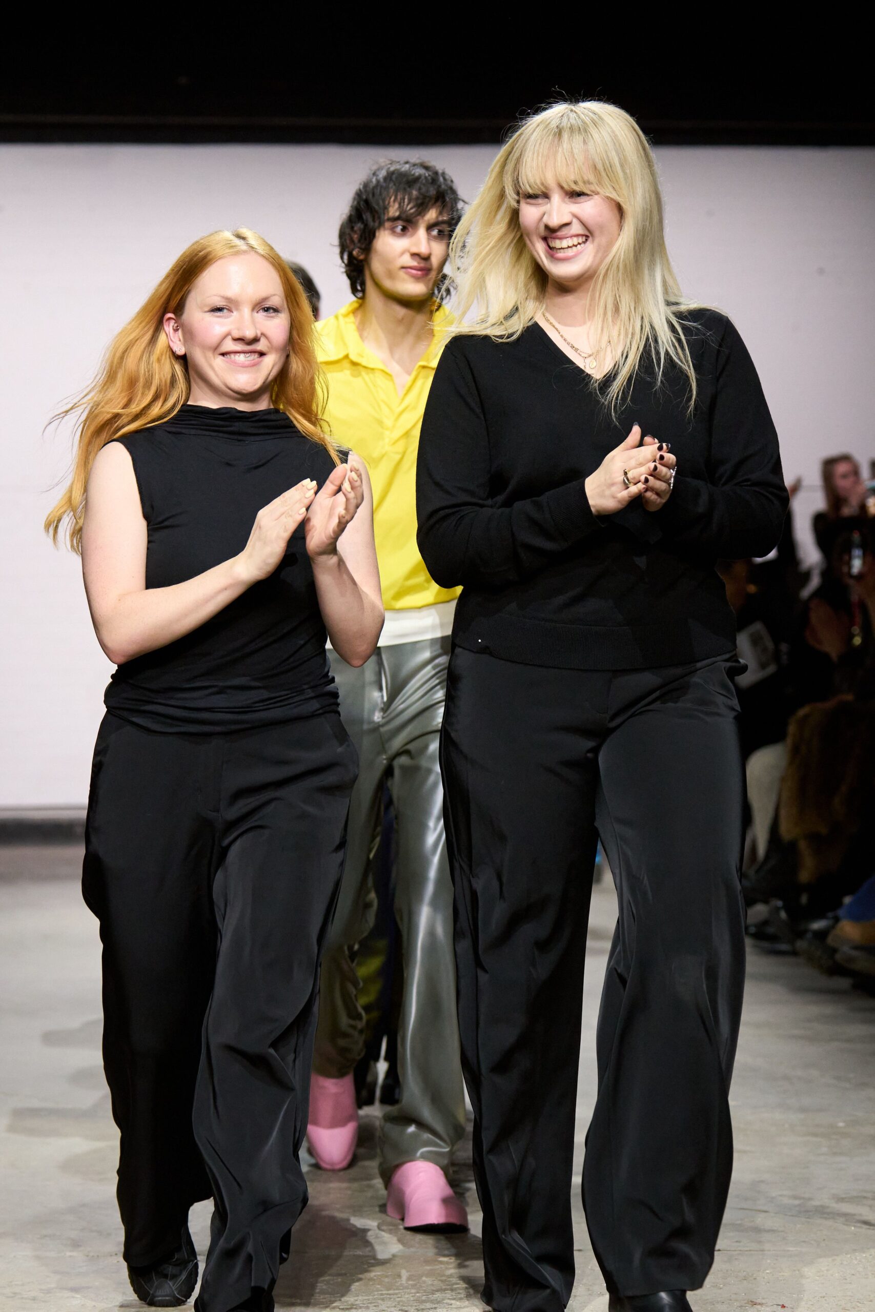 black top and pants, yellow shirt, pink shoes