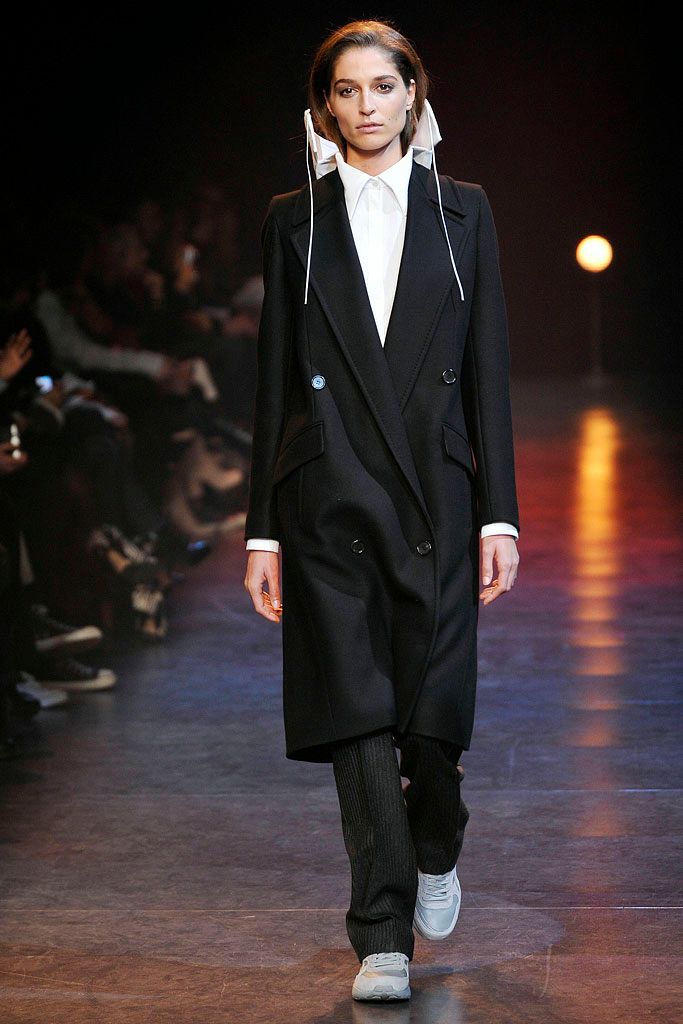 black double-breasted tailored overcoat