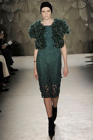 green feather bolero over midi dress